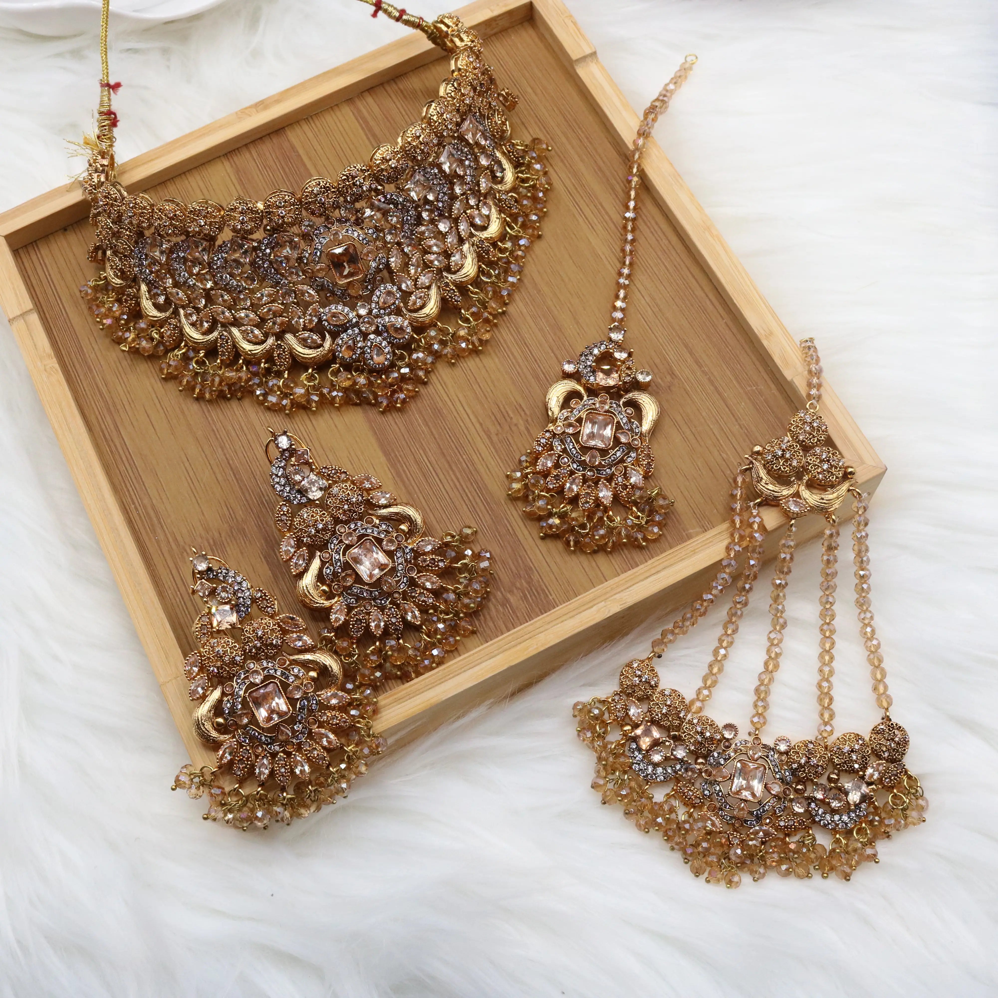 Complete wedding jewelry set in champagne gold with earrings and jhoomer