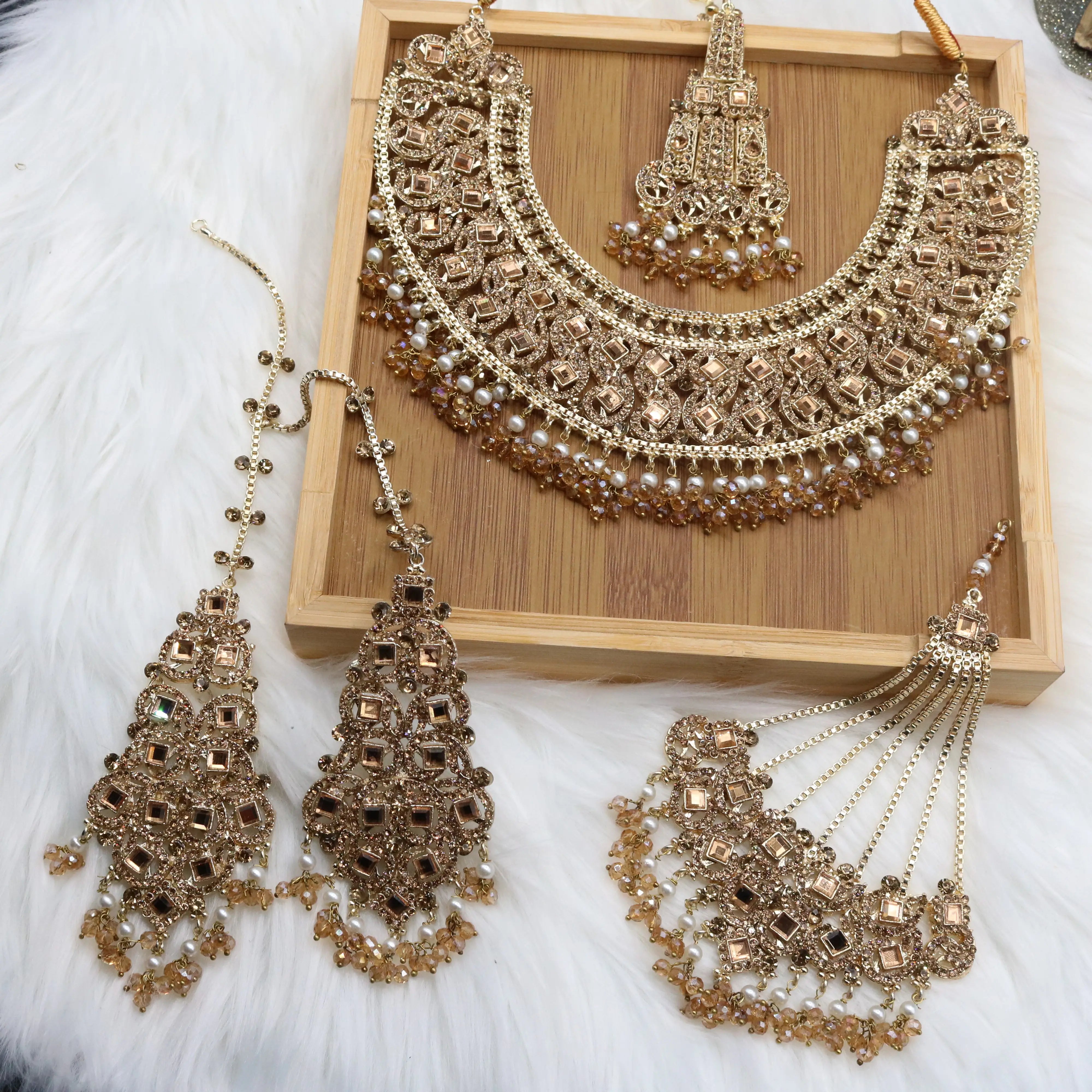 Pakistani bridal necklace set in gold with American diamonds