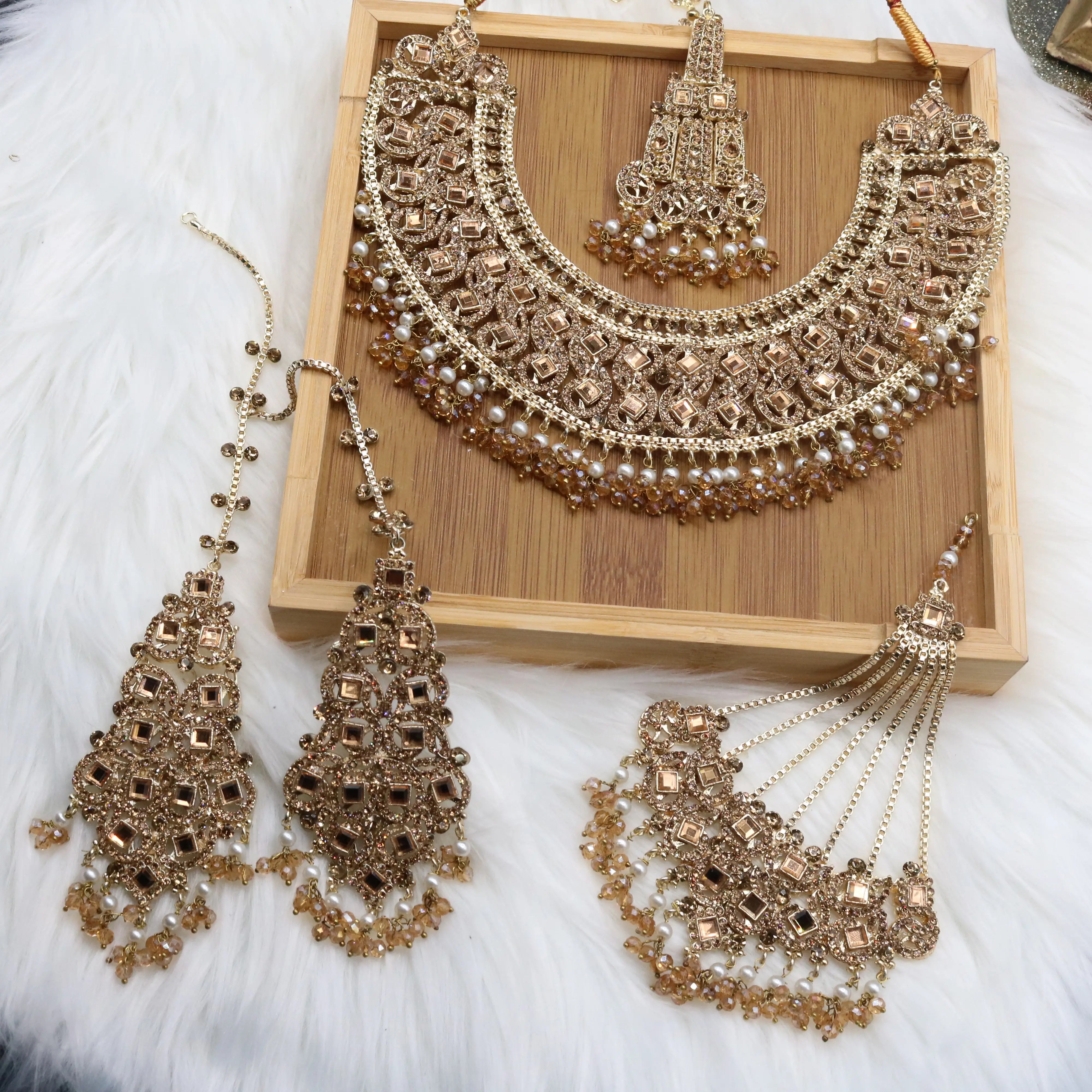 Wedding jewelry set with bib-style necklace, earrings & headpieces