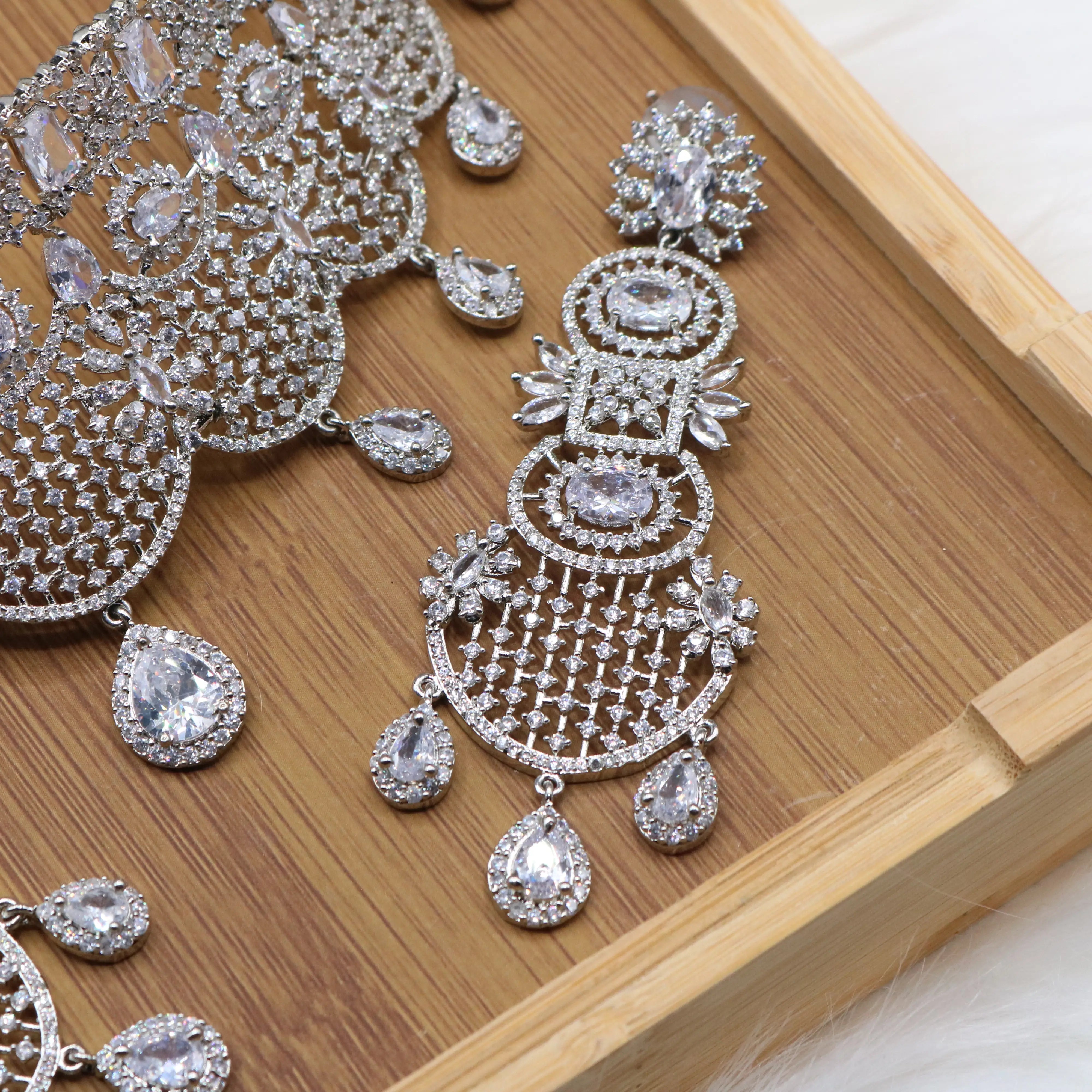 earrings view of Silver Pakistani bridal choker set with earrings and teeka