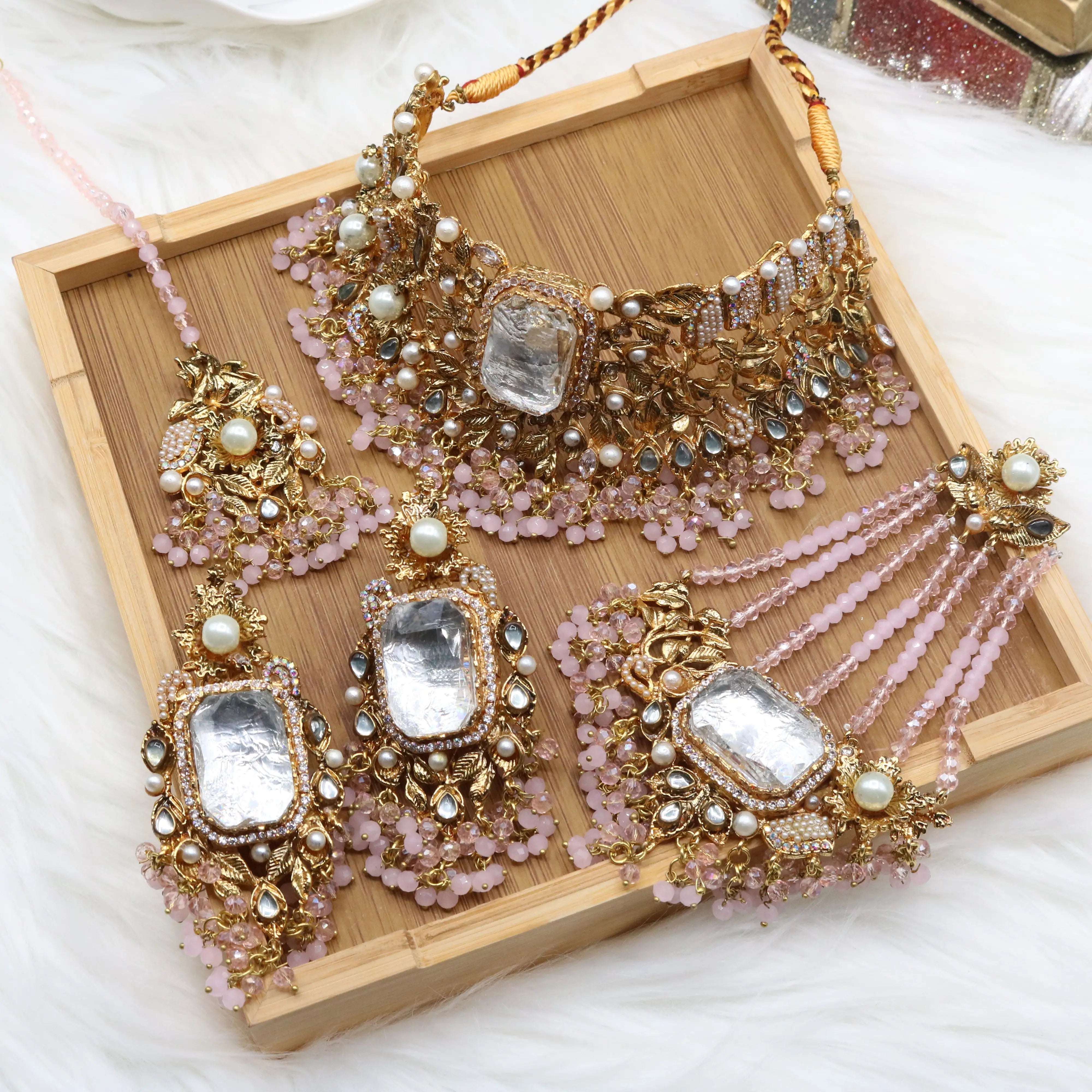 Kundan and pearl bridal jewelry in pastel pink