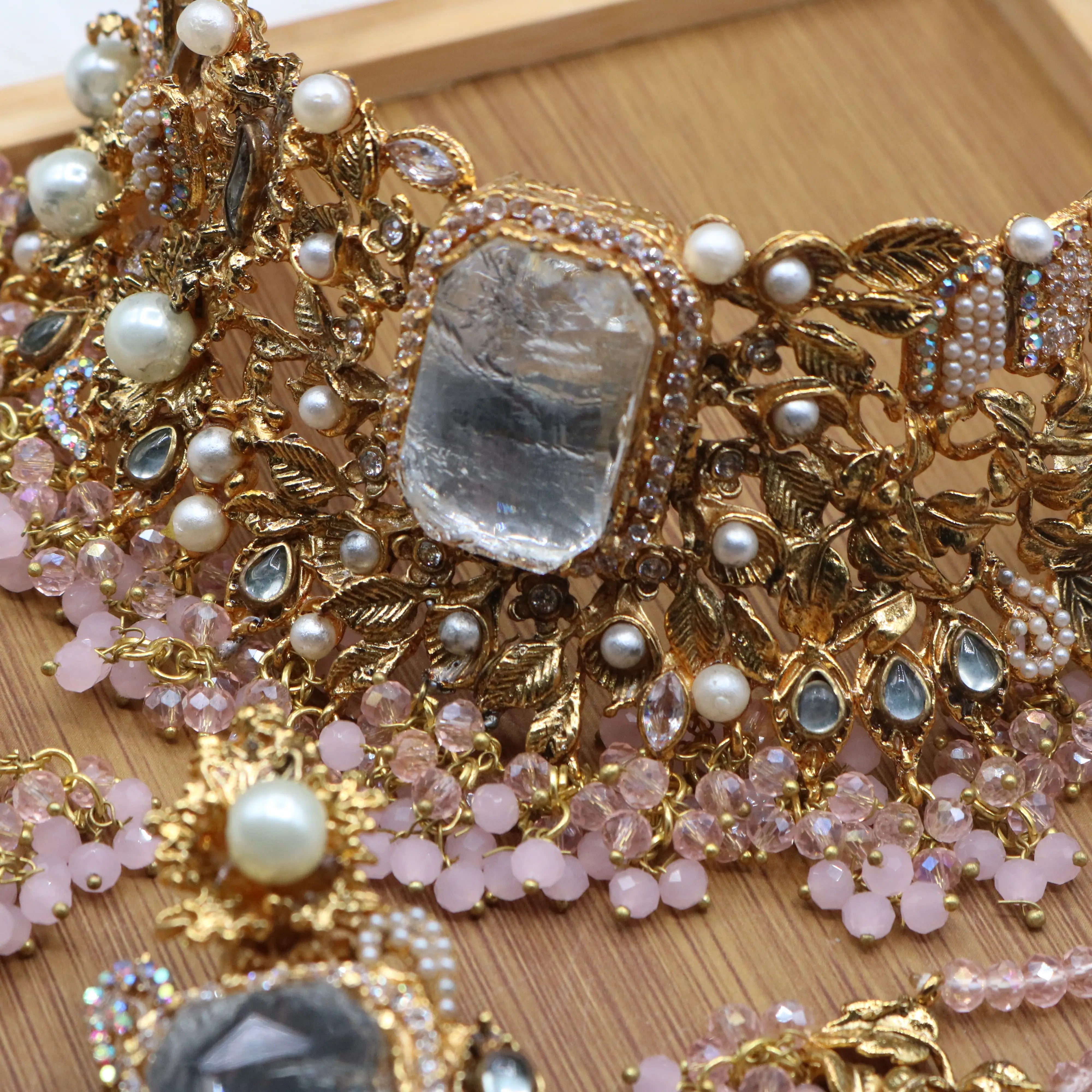 necklace view of Pastel pink and gold Pakistani bridal choker jewelry set with jhoomer