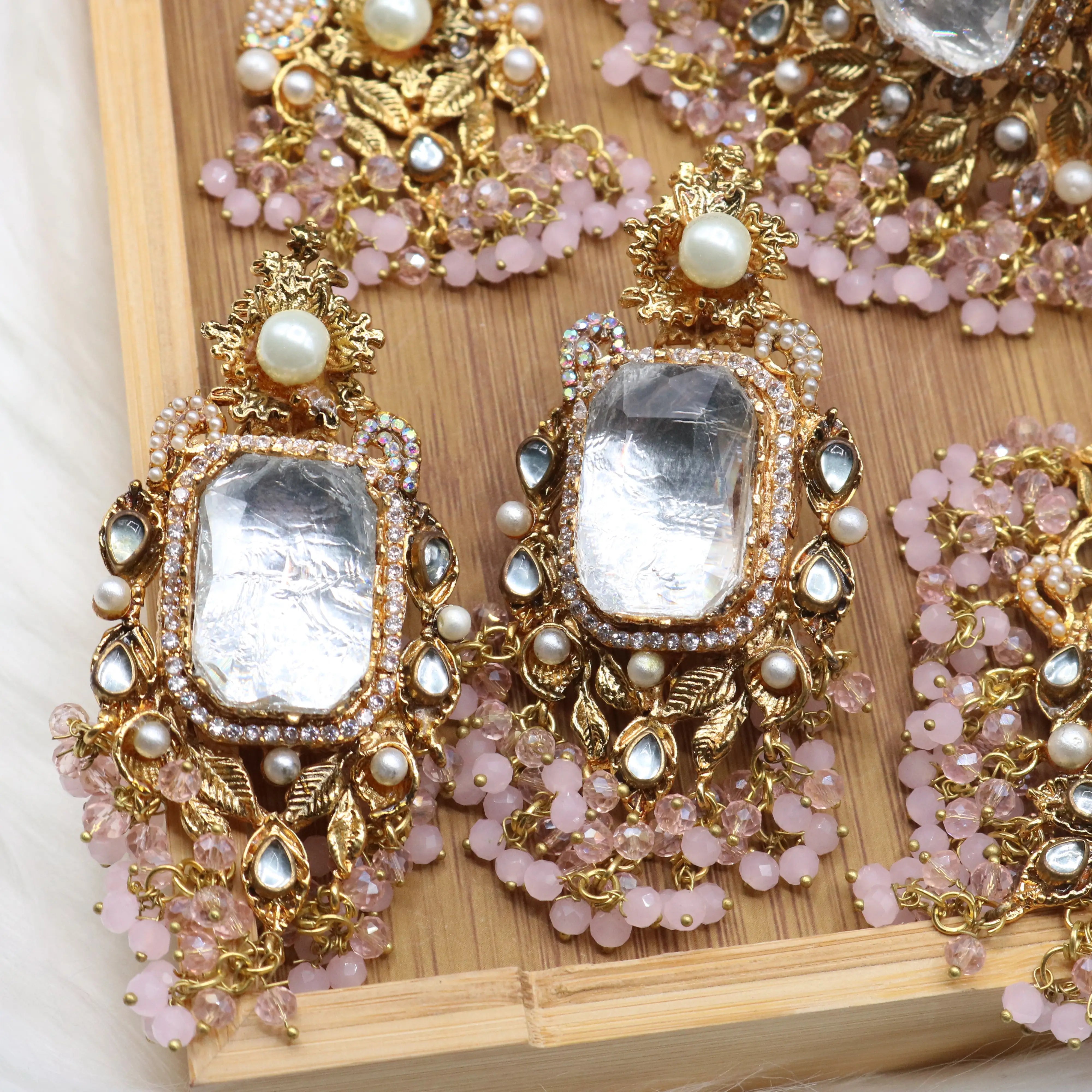 earrings view of Pastel pink and gold Pakistani bridal choker jewelry set with jhoomer