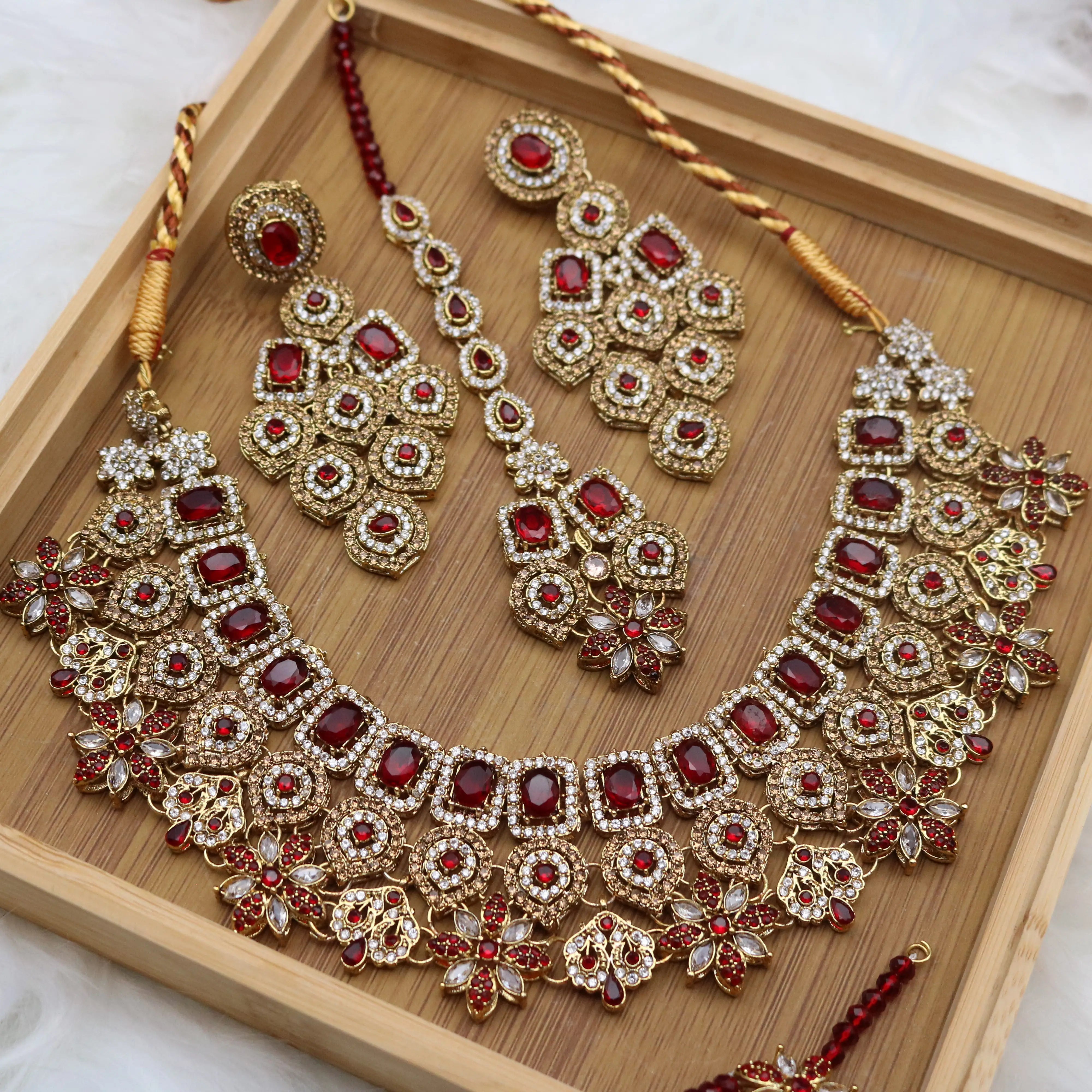 necklace view of Red Pakistani bridal necklace set with earrings, teeka & jhoomer