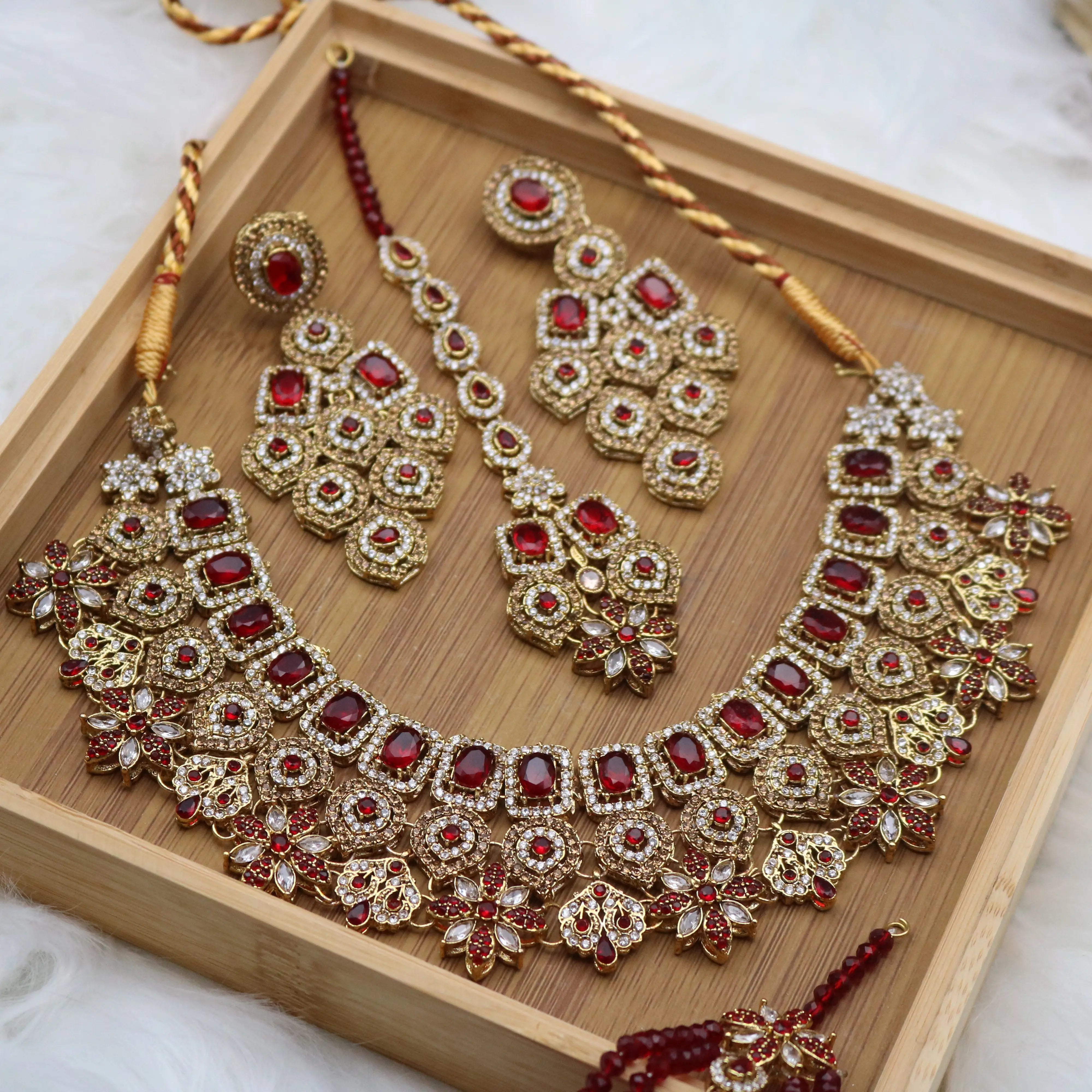 another closer view of Red Pakistani bridal necklace set with earrings, teeka & jhoomer