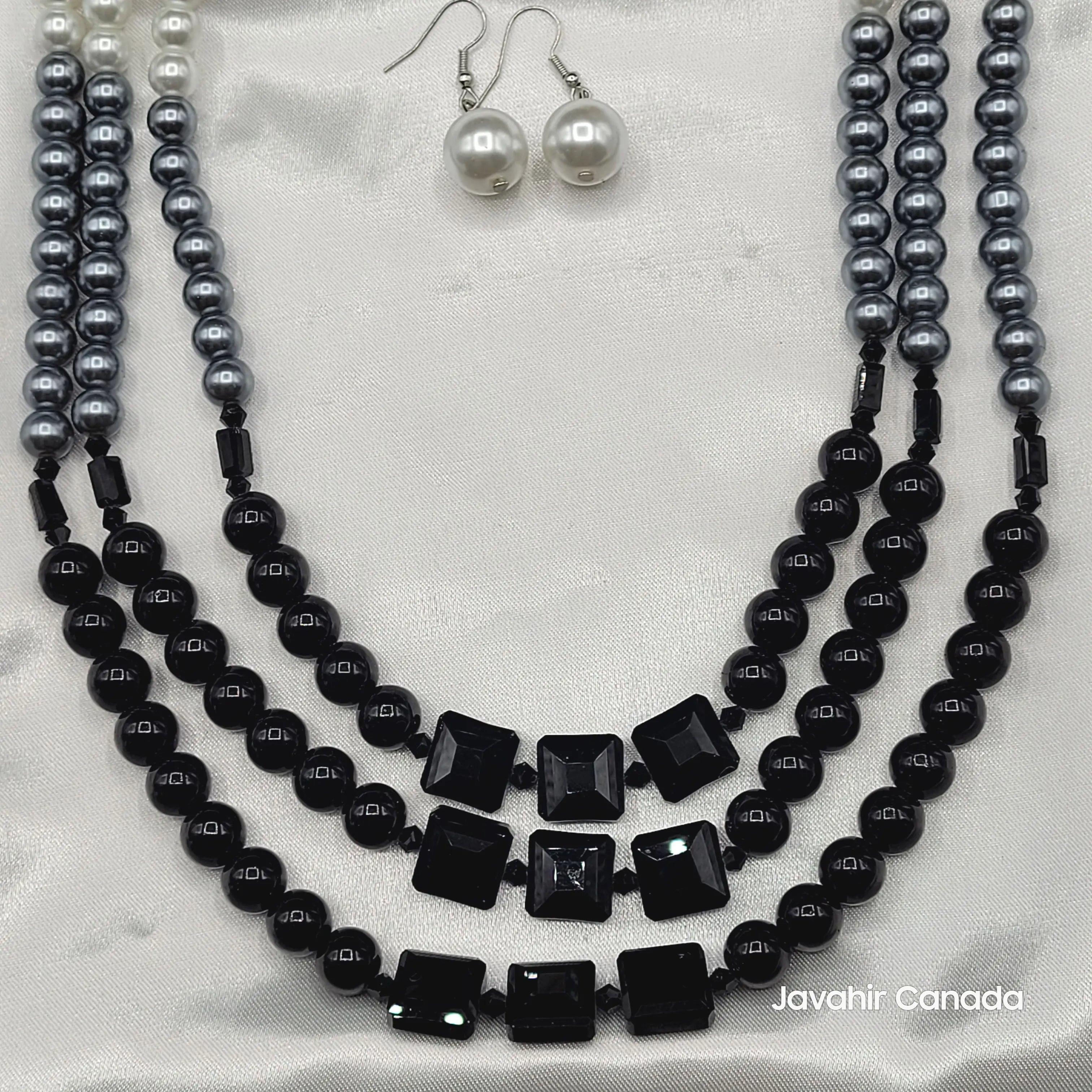 JV160 Midnight Black – black pearls with square jet-black crystals, laid flat