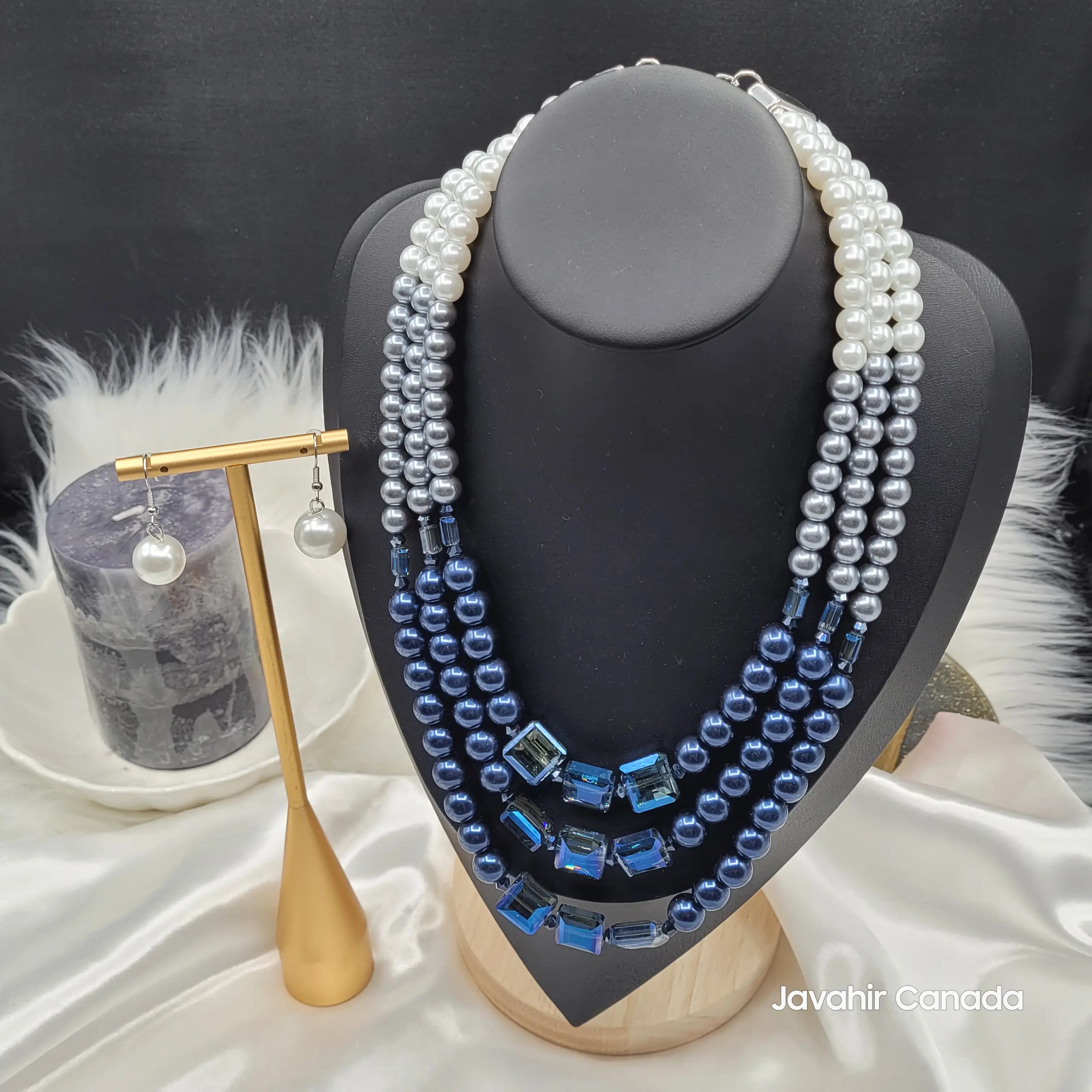 Full image of JV160 Navy variant styled with silver hardware and earrings