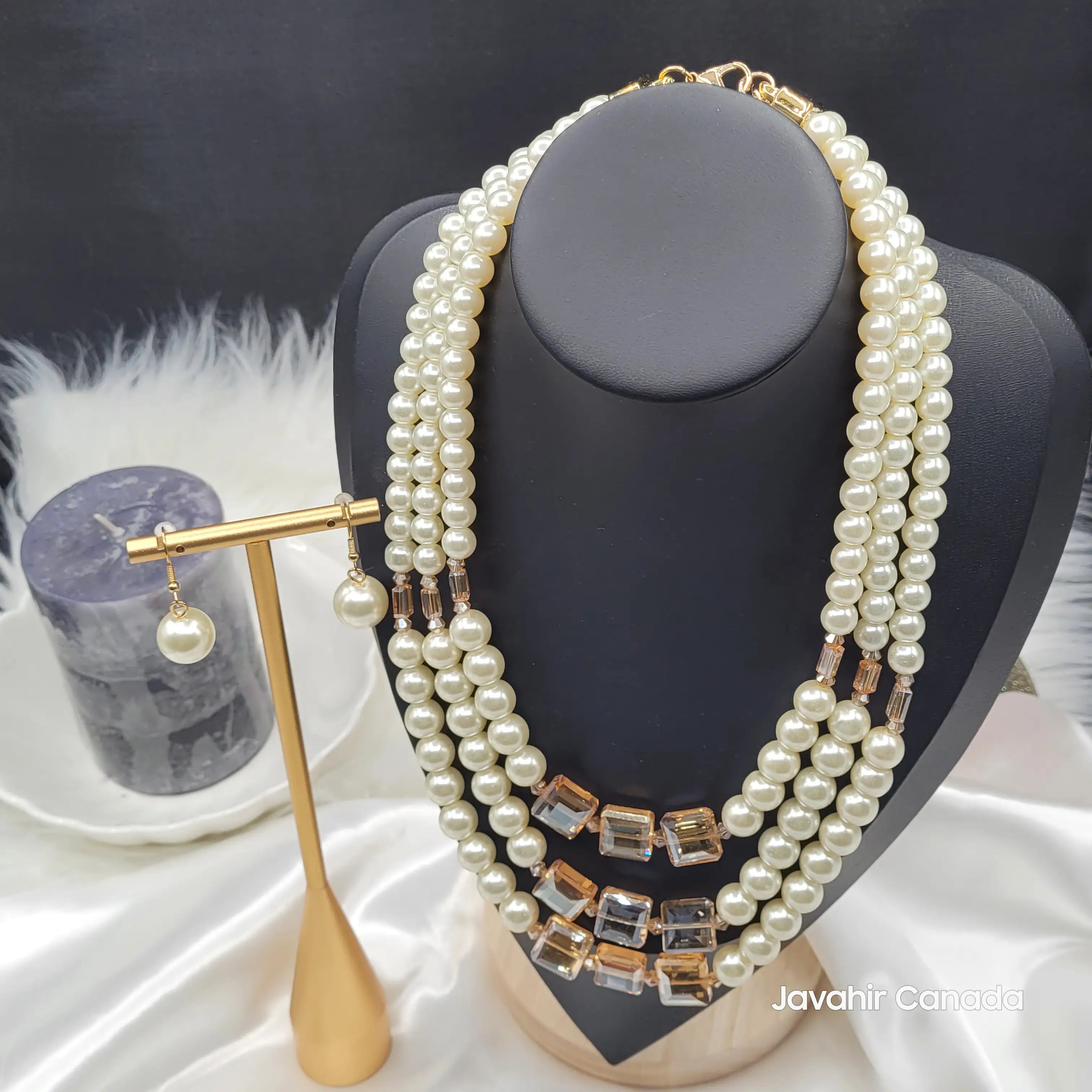 JV160 in Ivory Gold – Triple-layer pearl necklace with golden crystals and matching earrings
