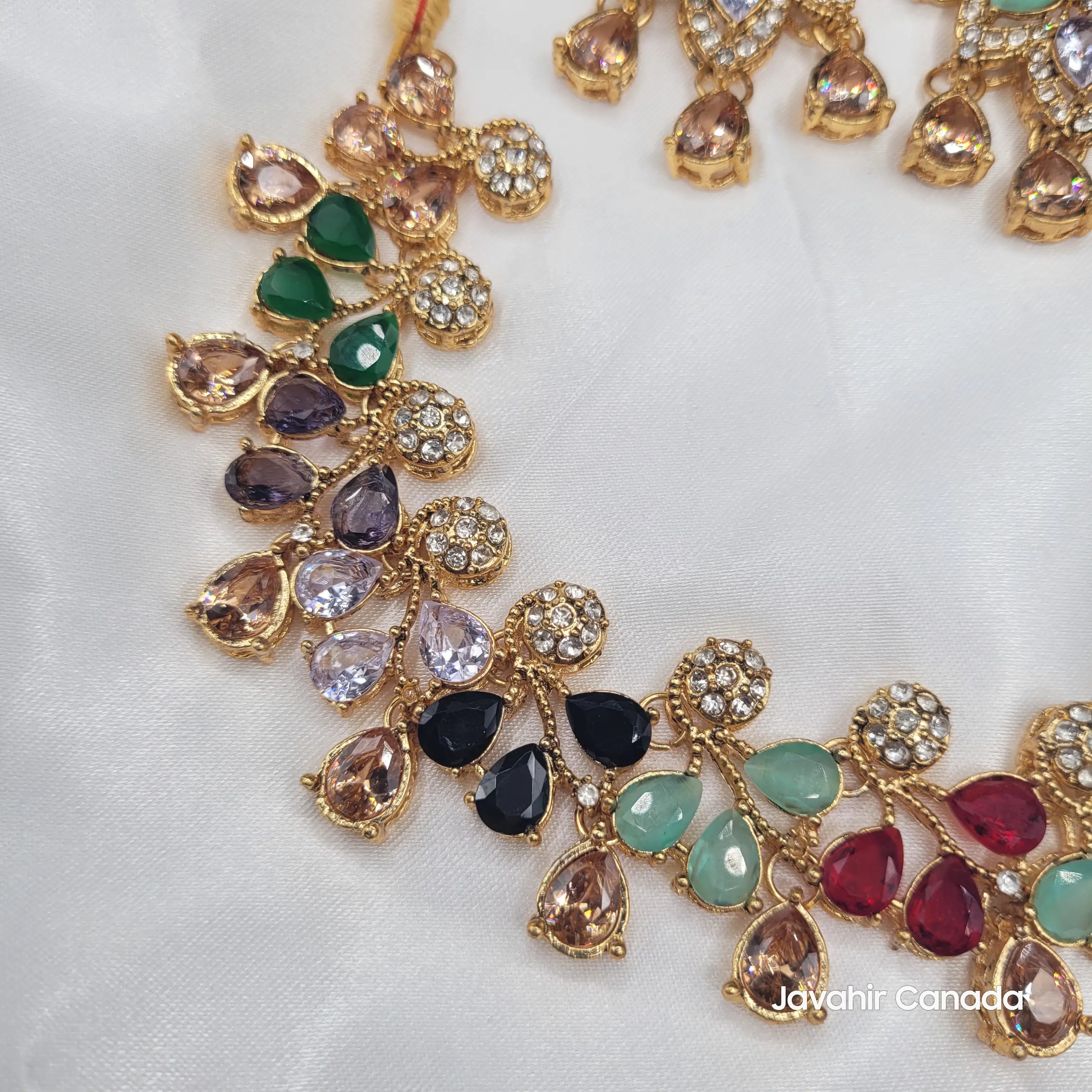 Side view of JV20 necklace showcasing multicolor gemstone arrangement