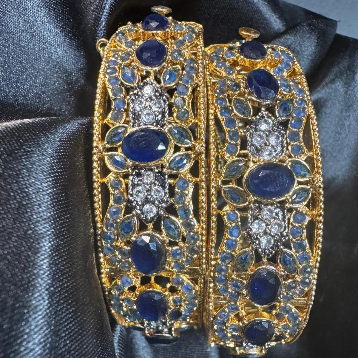 Top view of JV3000 bangles showing floral motif and crystal accents