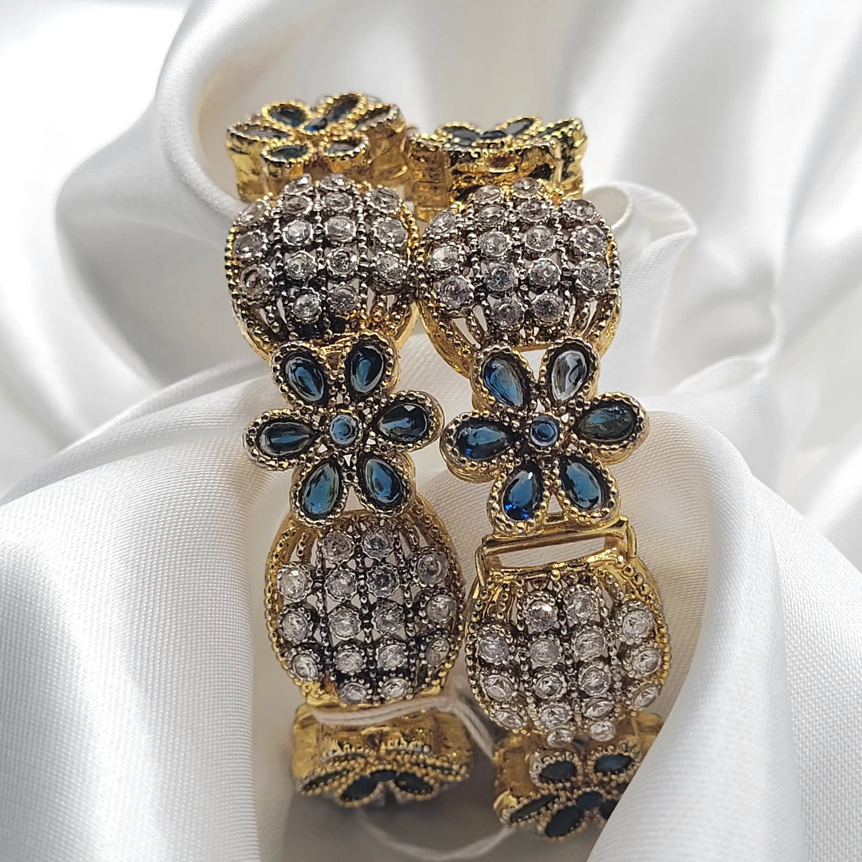 Blue stone-studded openable bangles on white fabric background – JV3001 variant