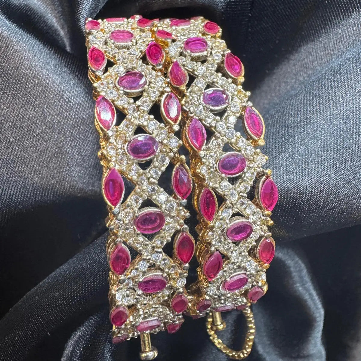 JV3004 bangles – close-up showing pink stone crisscross design
