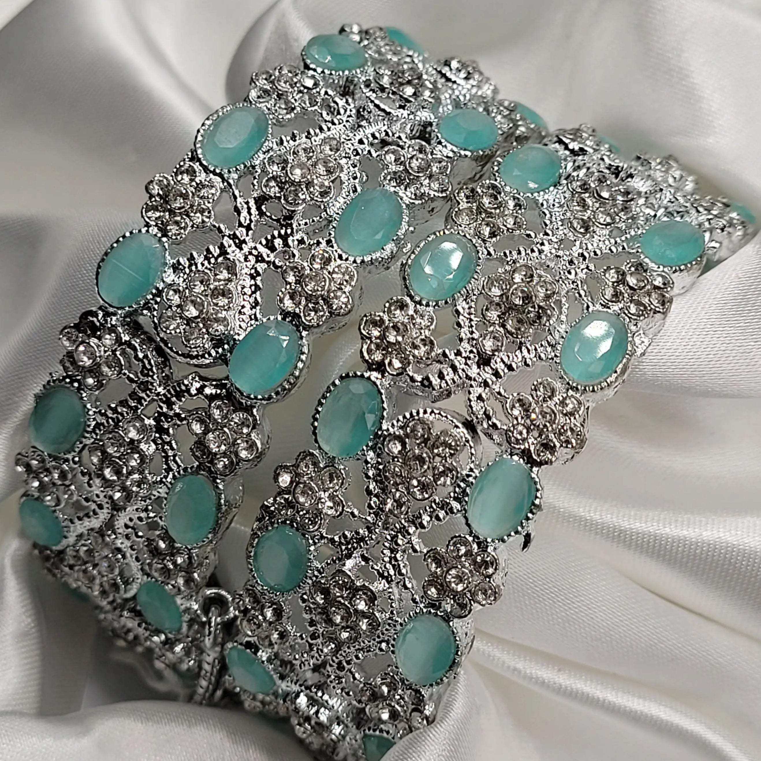 JV3005 mint green stone bangles with floral CZ details – front view