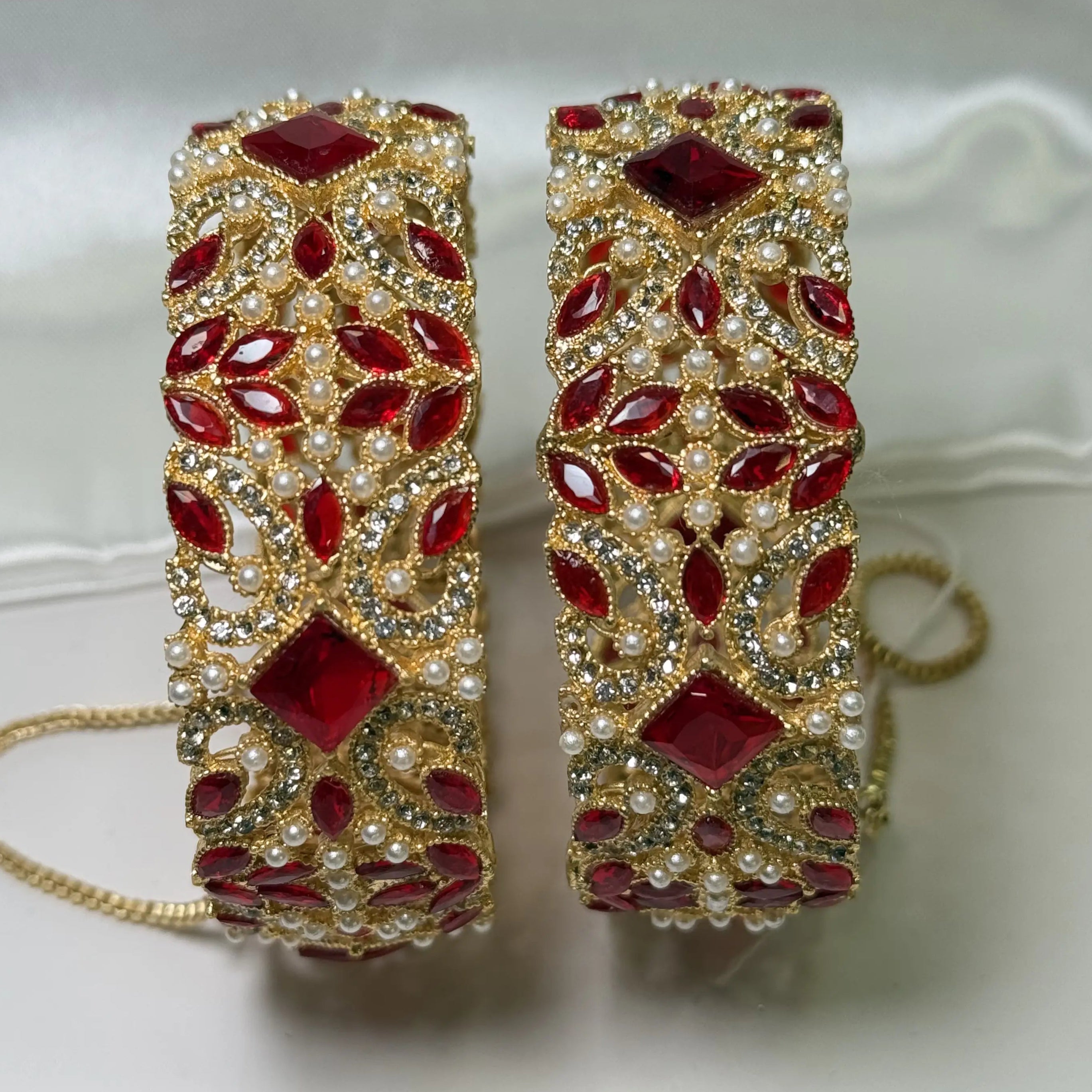 JV3007 gold-toned bangles with red stones and pearl detailing
