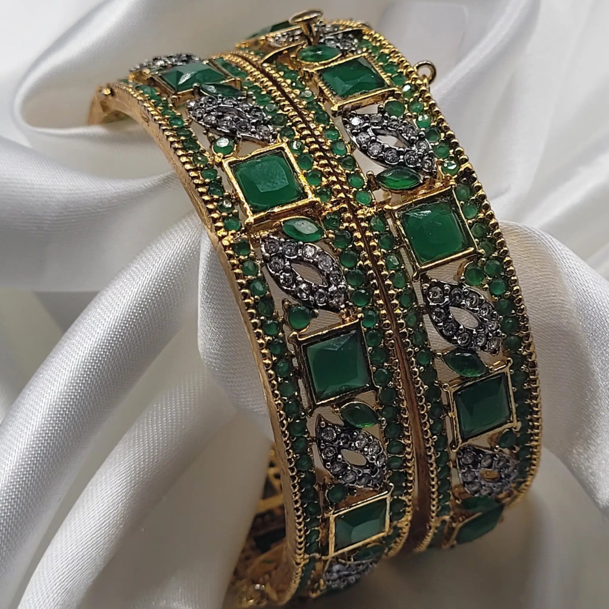 Green stone bangles with detailed paisley CZ motifs – close-up