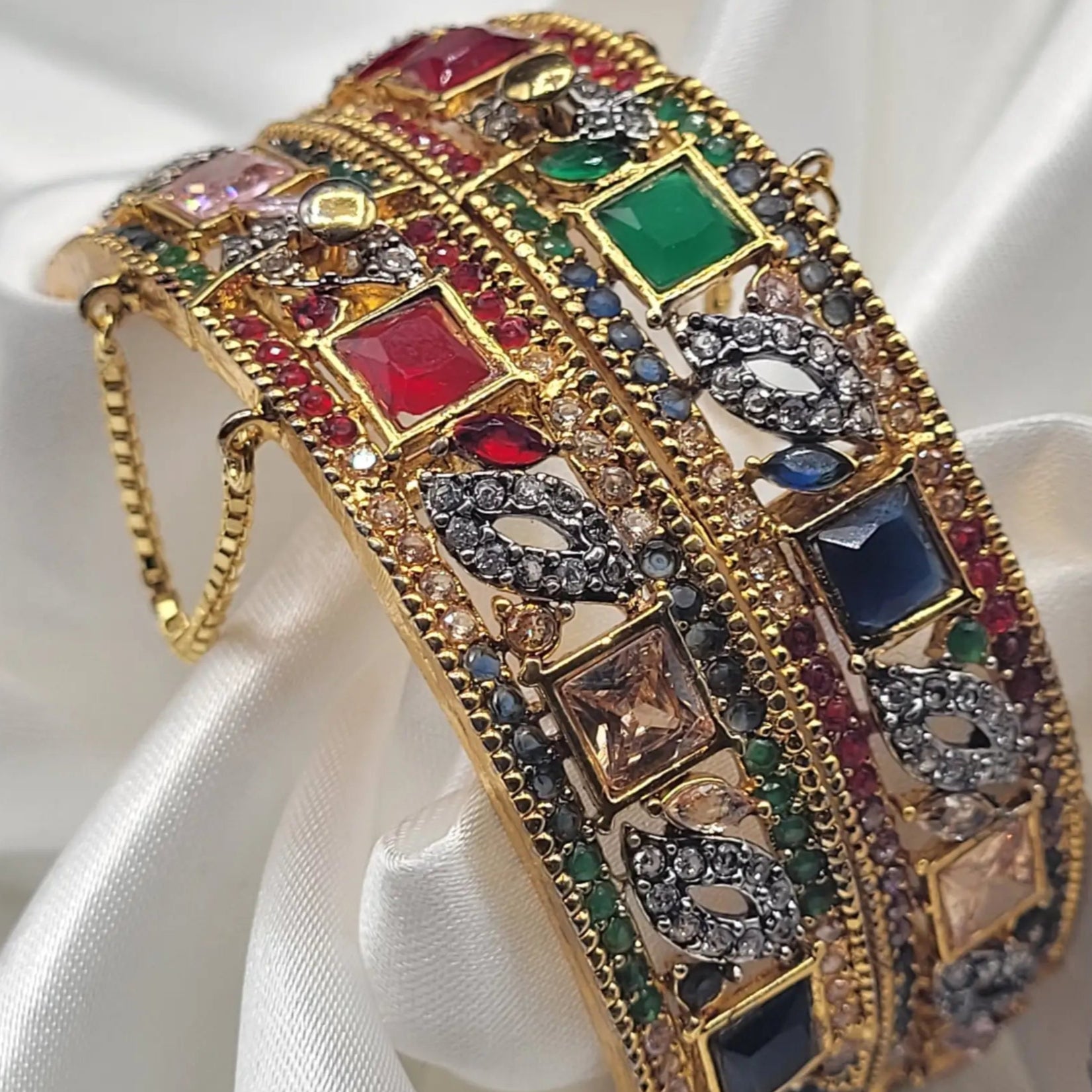 Multicolor festive bangles with ruby, emerald, and sapphire tones – side view