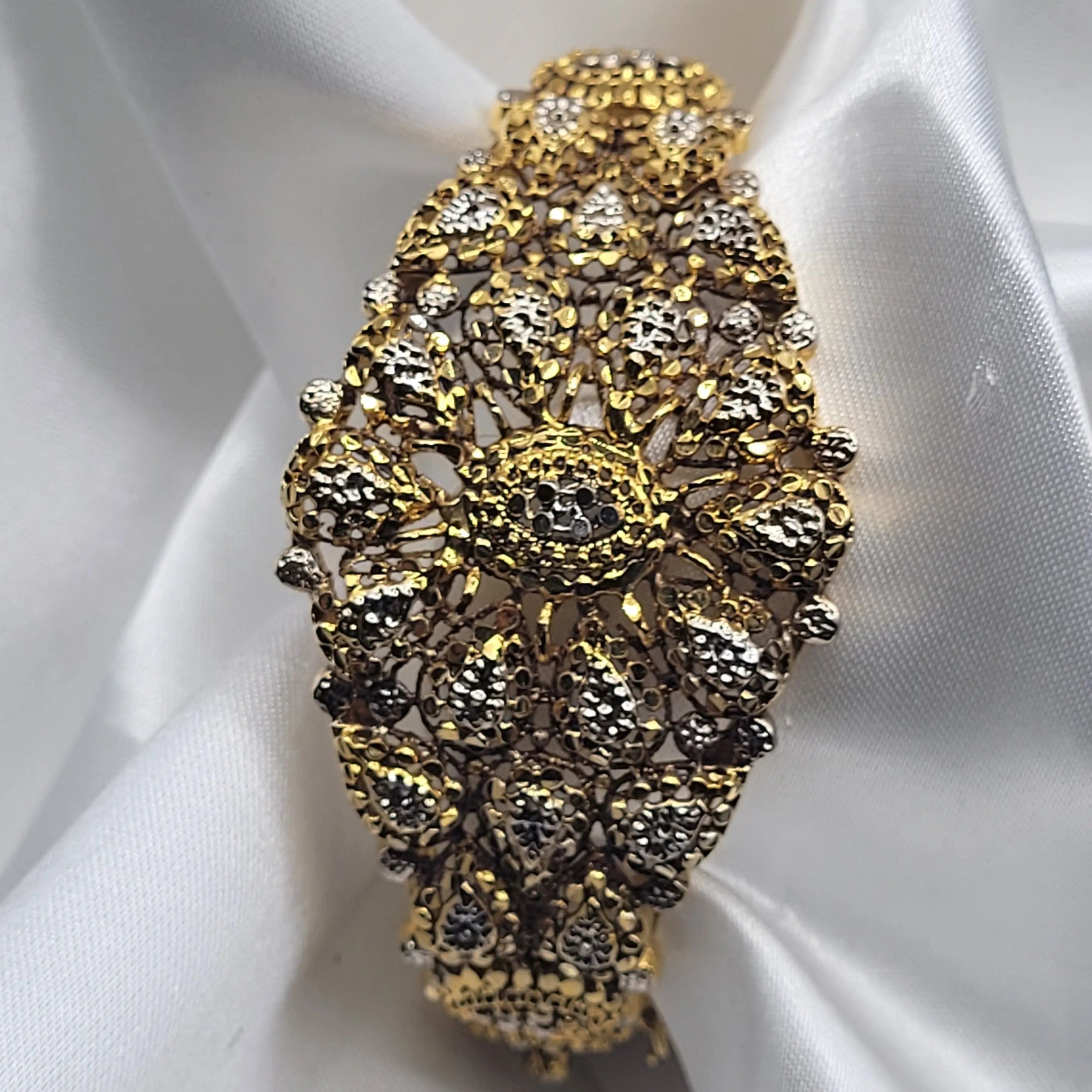 Top view of JV3017 statement bangle with floral textured design