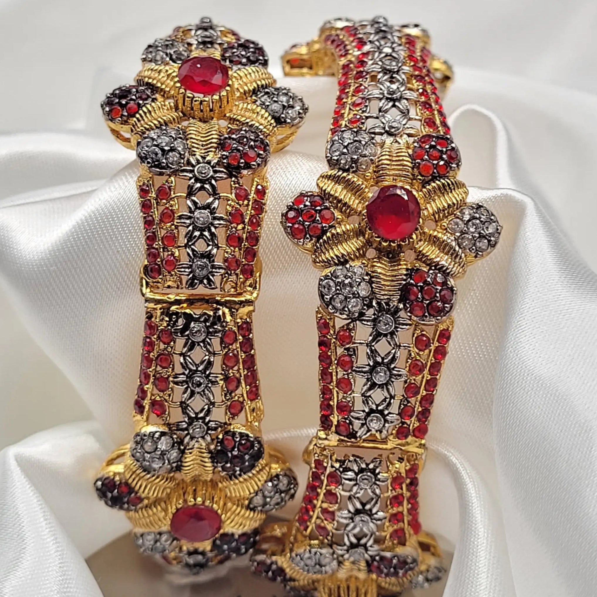 Close-up of JV3019 openable bangles with red center stones