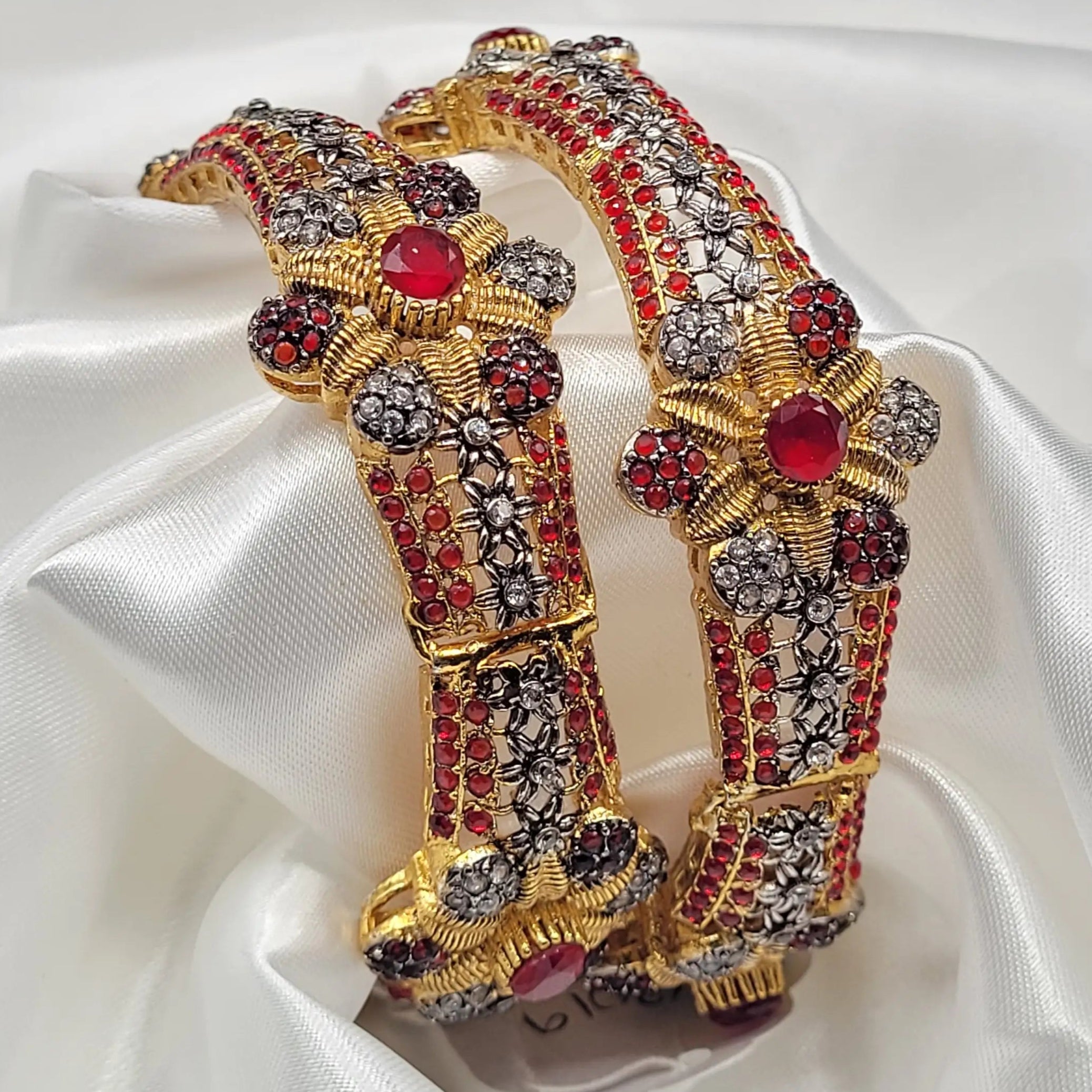 Side view of JV3019 antique gold bangles with floral motifs