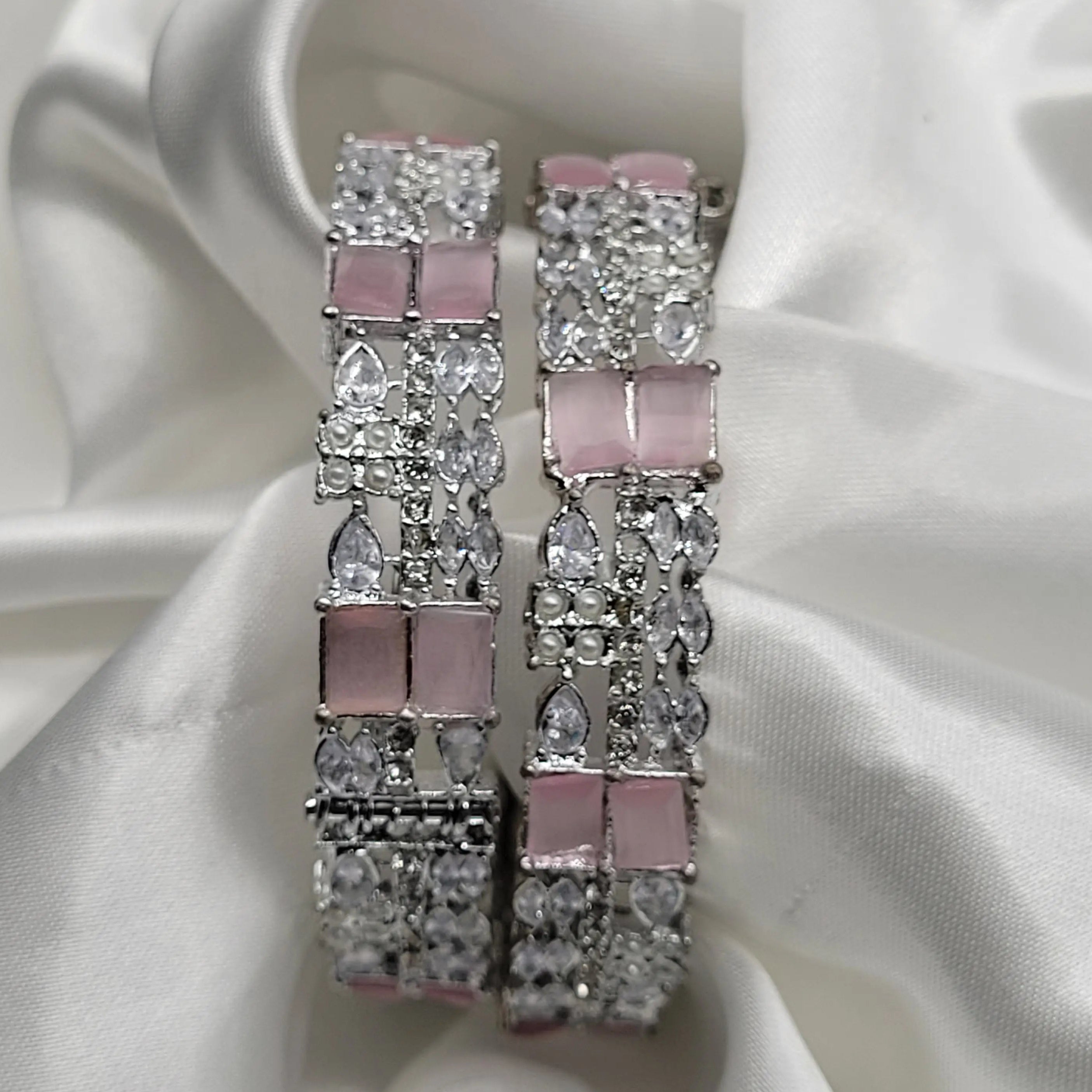 Elegant pastel pink openable bangles with white CZ stones – top view