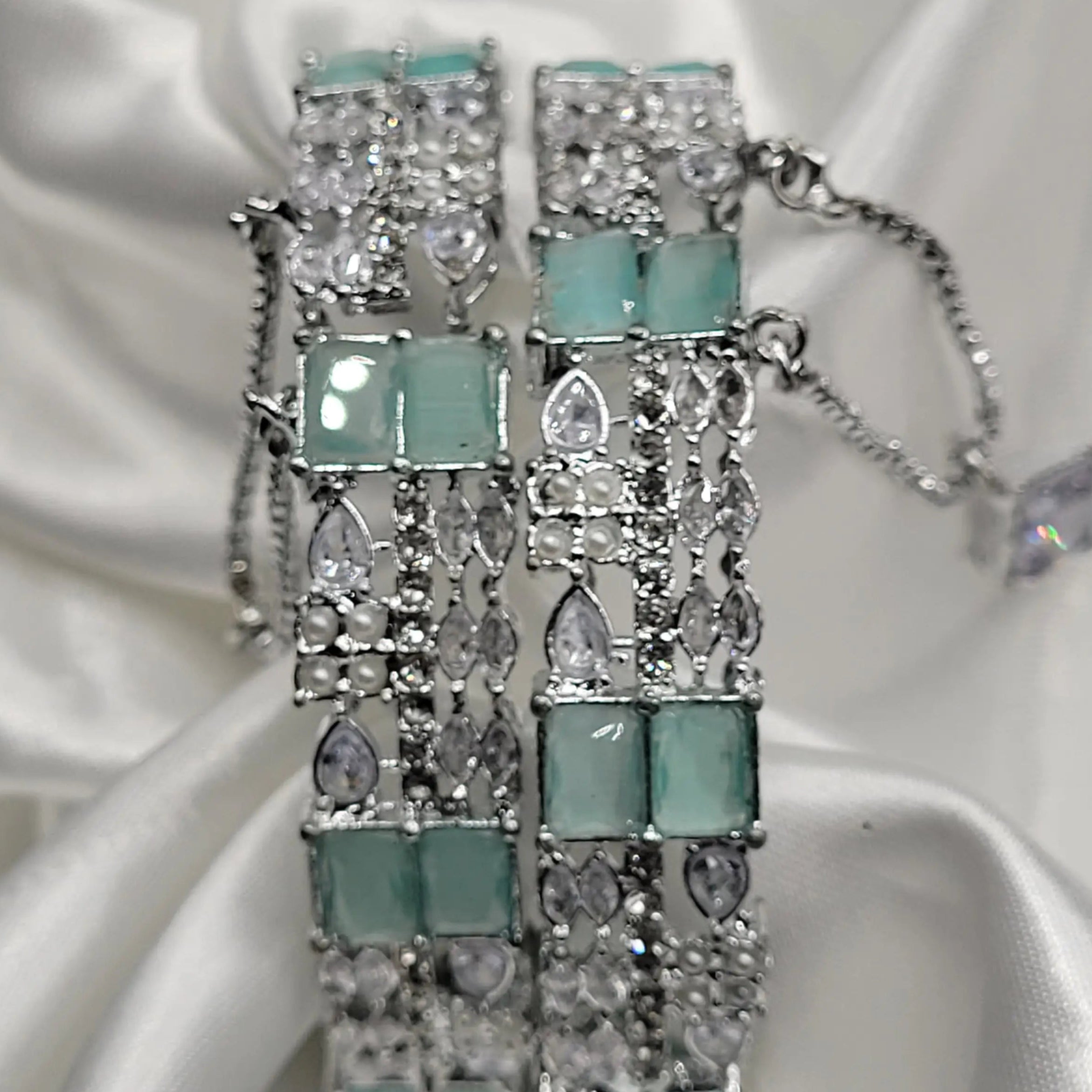 Pastel mint bangle pair with openable clasp – top angle