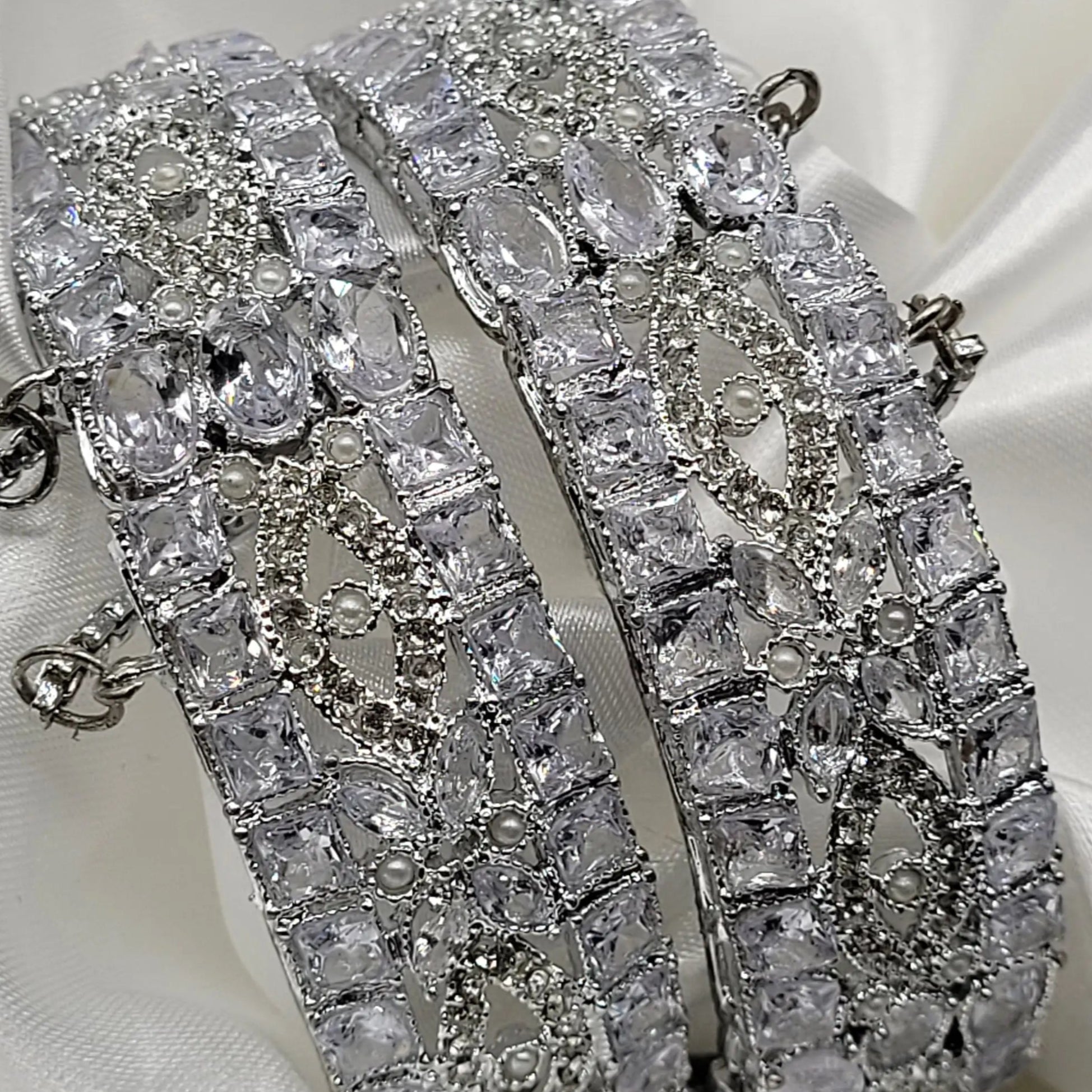 Statement bangles with all-clear CZ and secure clasp – close look