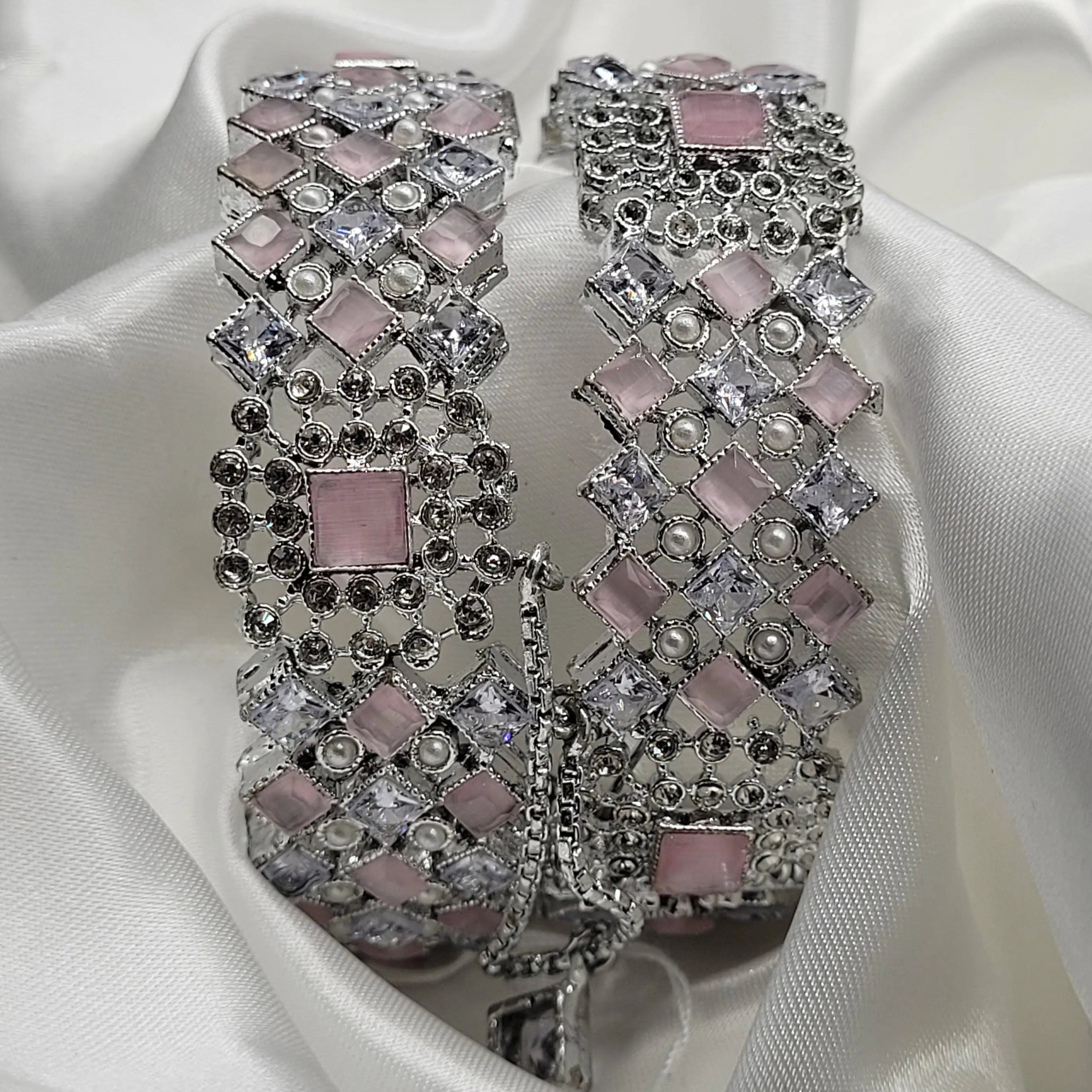 Pink stone bangles with embedded pearls and CZ accents – front display
