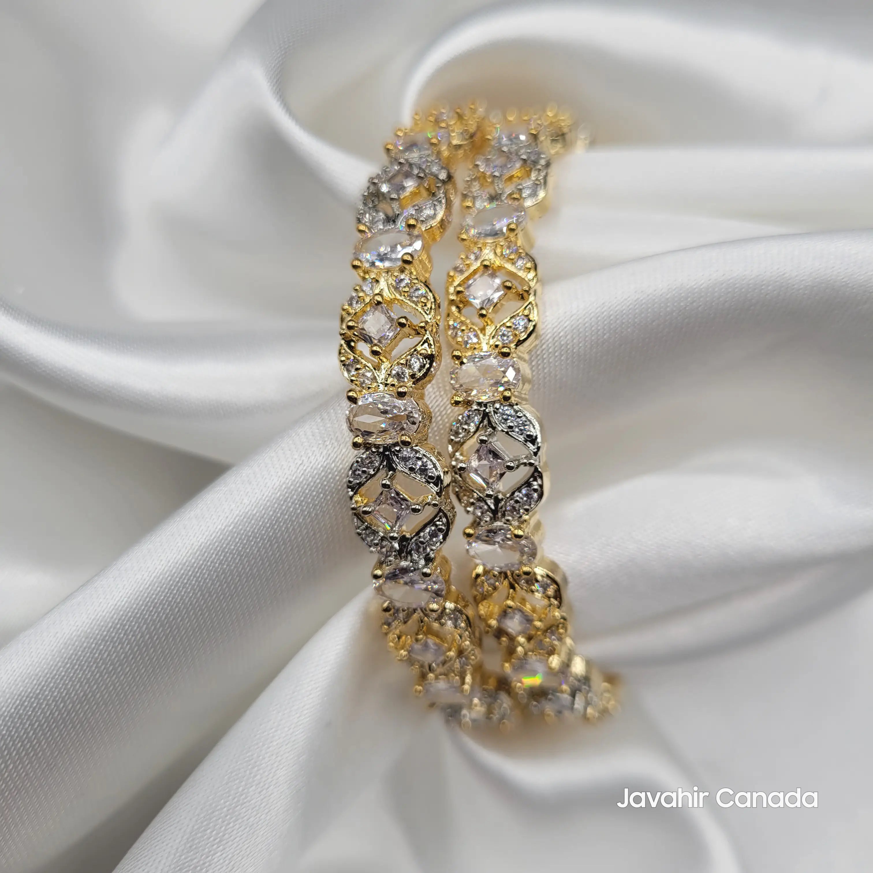 JV3024 Gold-Plated Bangles on White Silk – Soft Glam Look