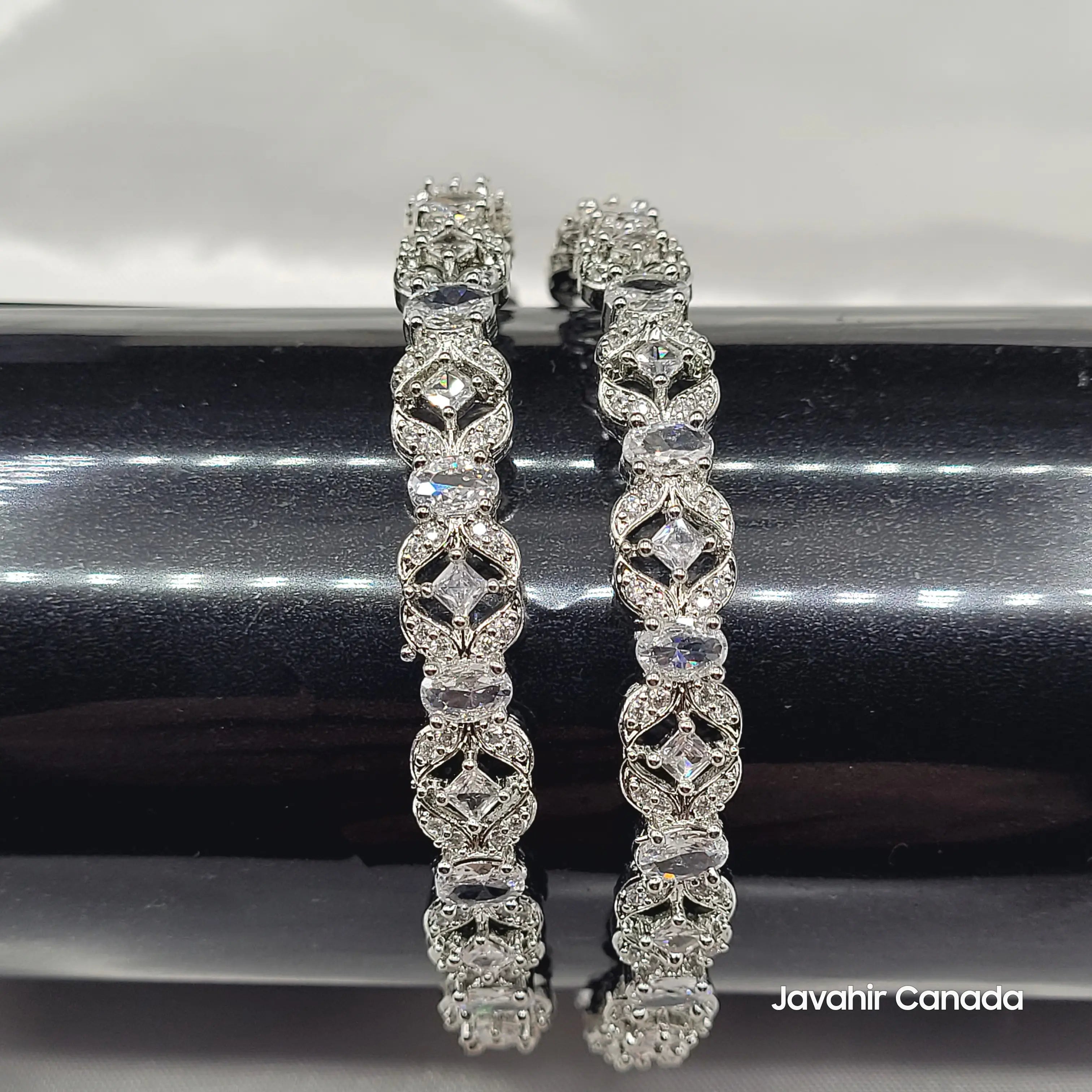 JV3024 Silver Bangles Displayed on Black Rod – Elegant Shine