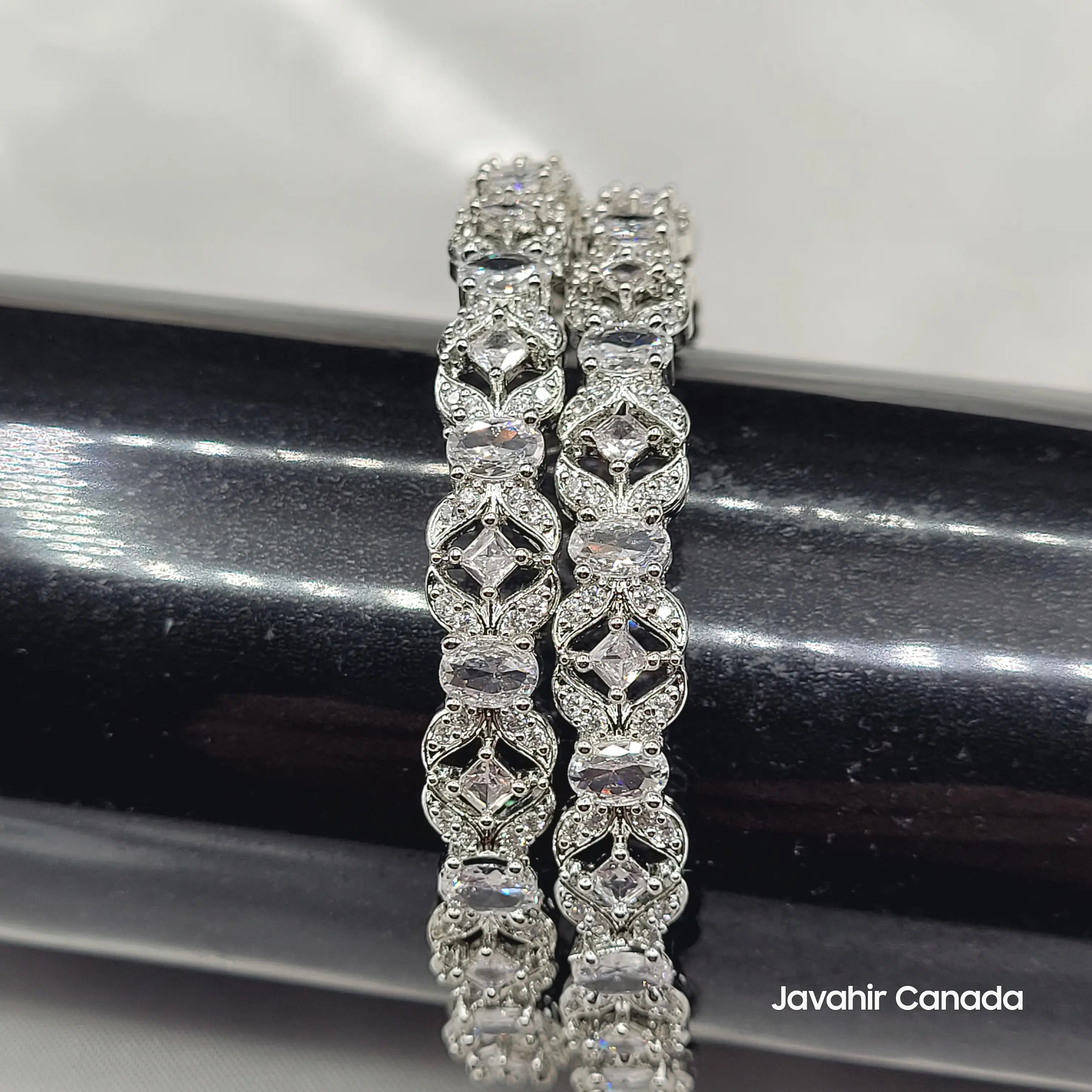 Side View of JV3024 Silver Bangles – Close-Up on Settings