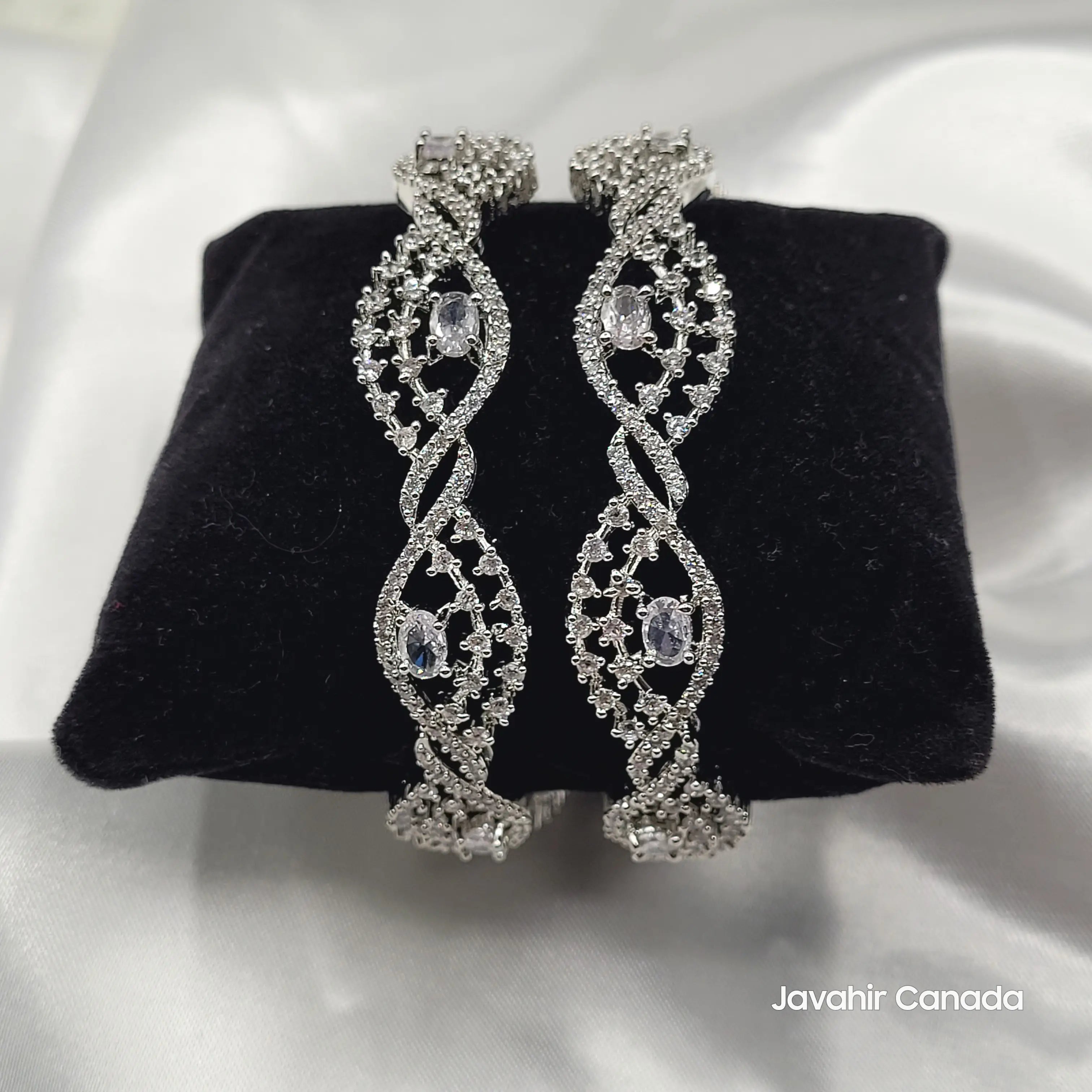 JV3027 Silver-Tone Bangles on Black Velvet – Close-Up on Twist Pattern