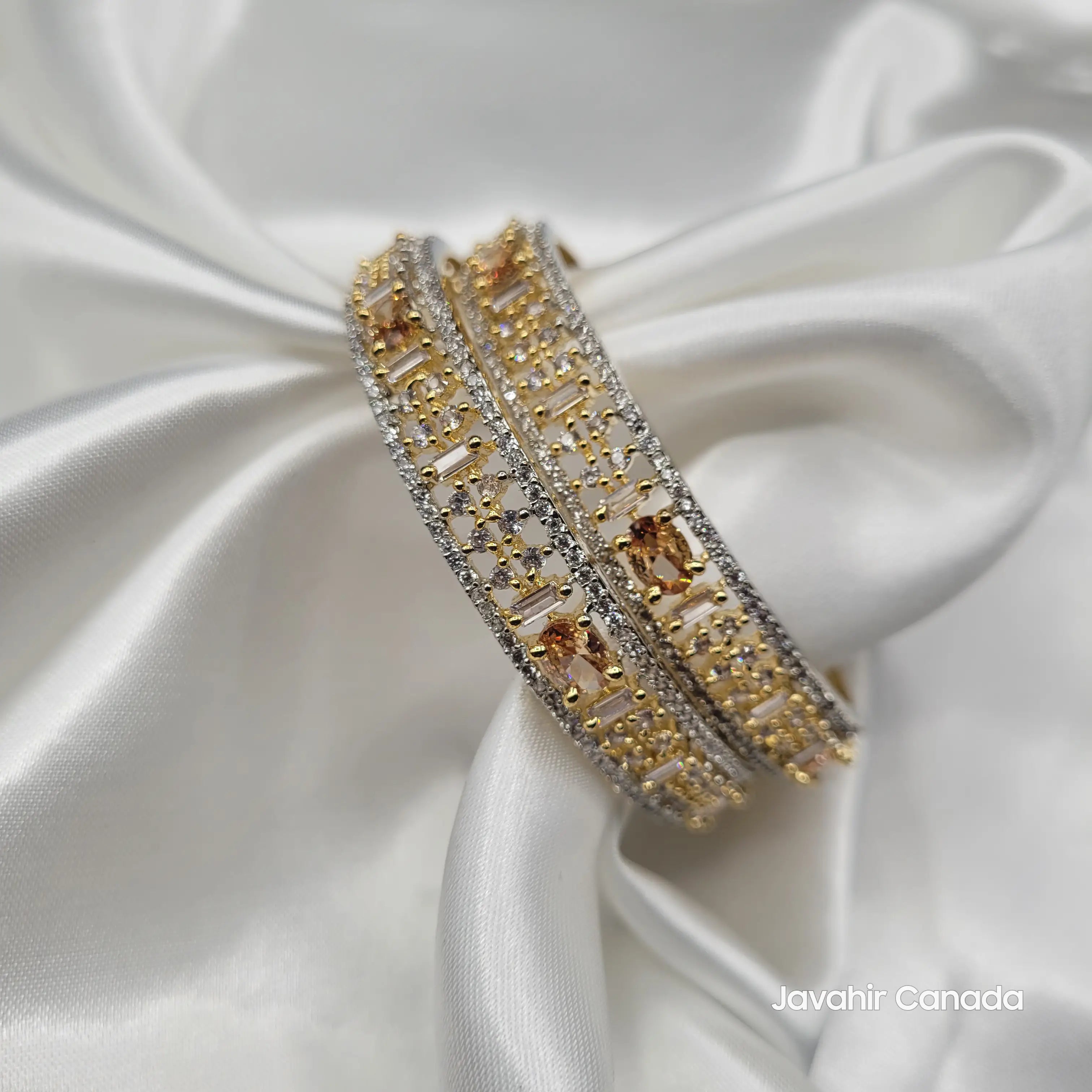 JV3028 Gold Bangles on Satin – Close-Up of Baguette-Cut Detailing