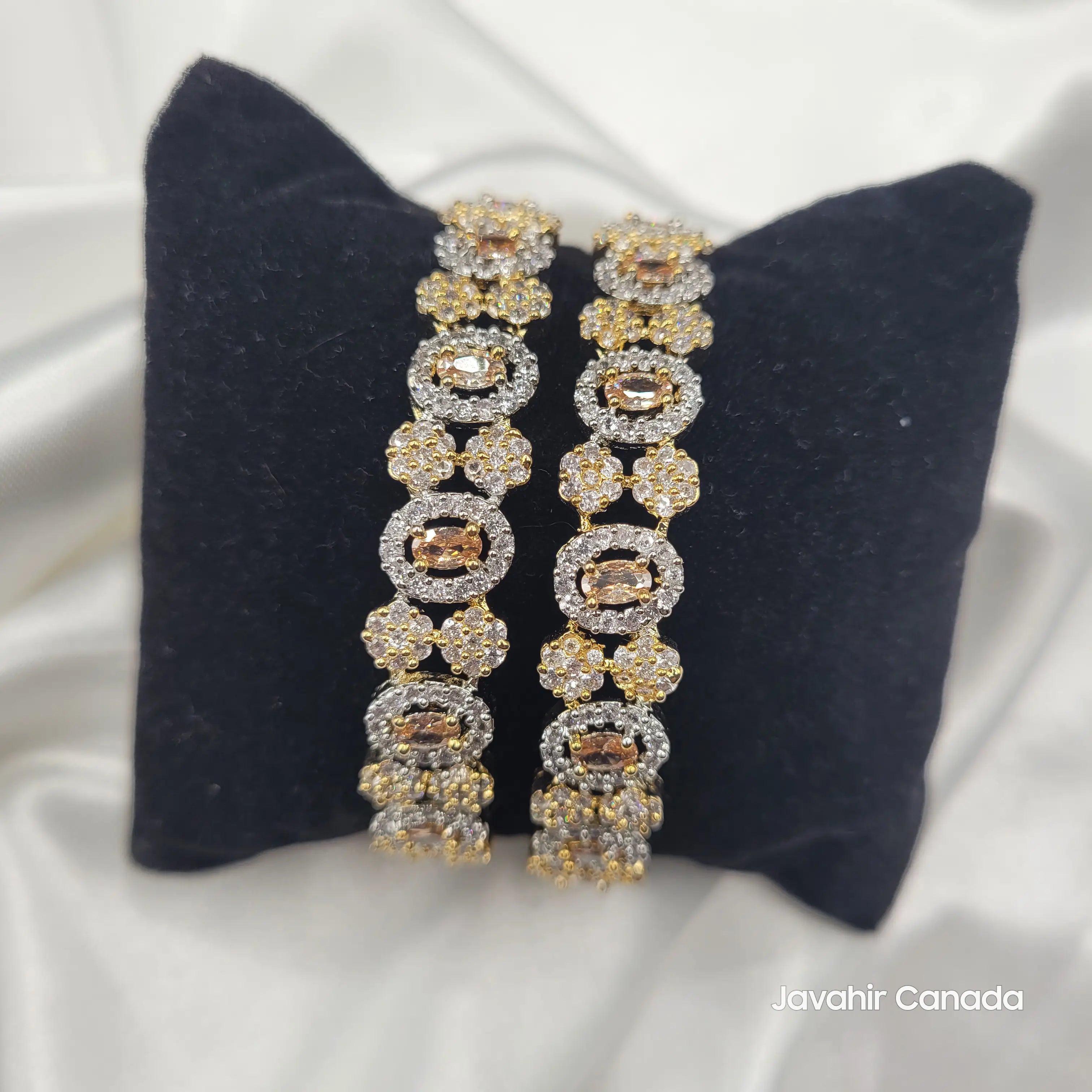 JV3030 Bangles – Oval Center Champagne Stones on Black Velvet Display