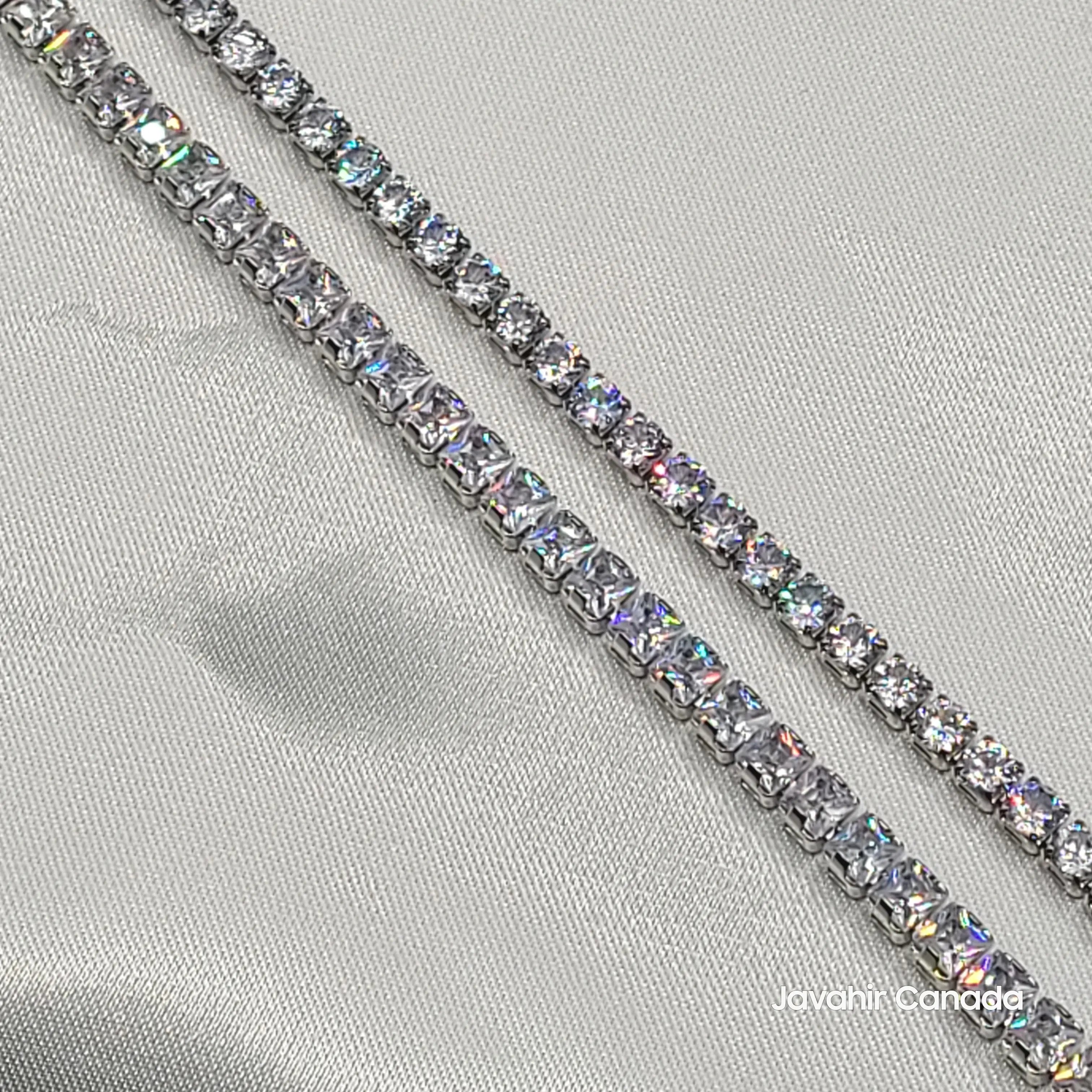 Close-up of American diamond bracelets in silver finish – thin vs thick
