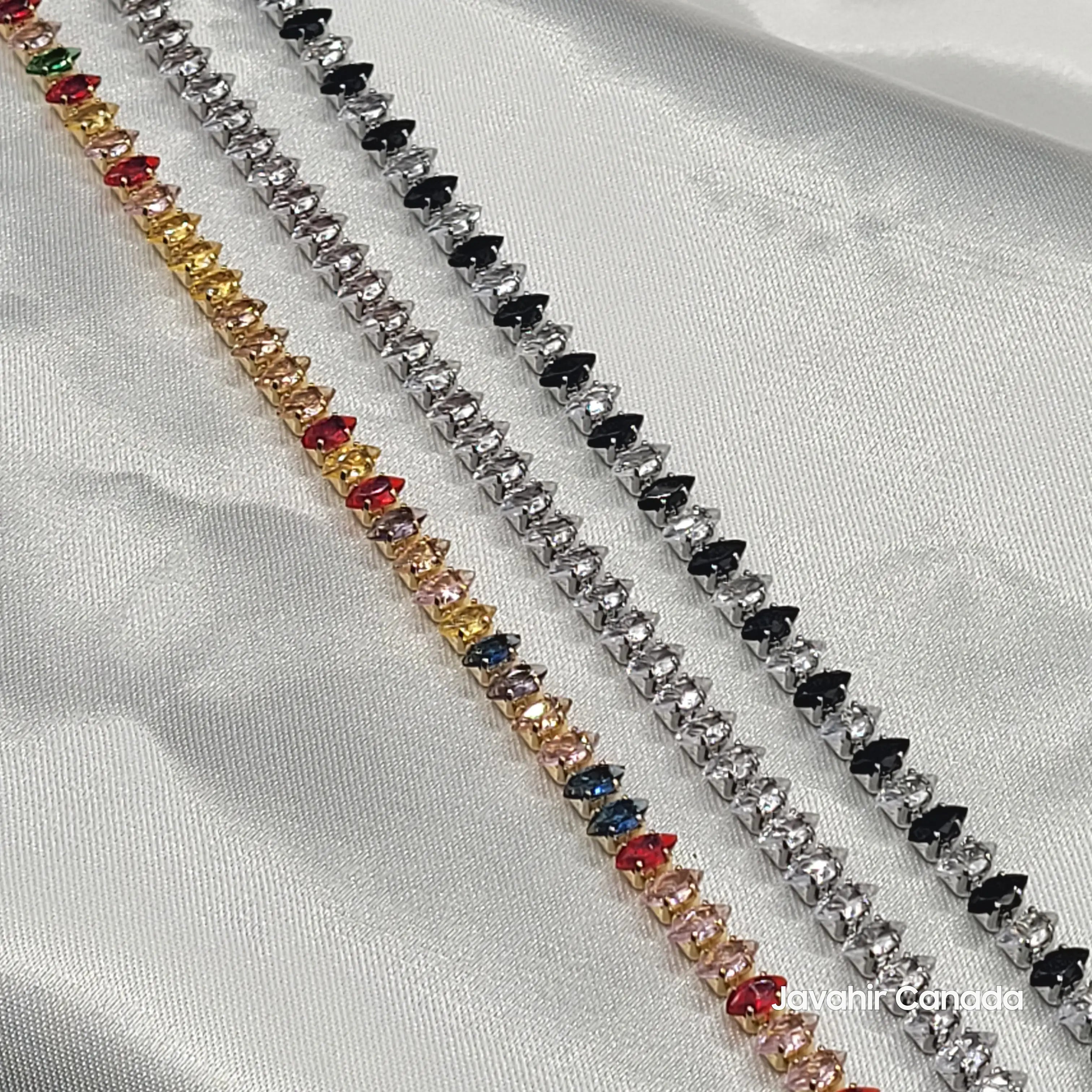 JV4003 designer bracelets – plain silver, black stones, and multicolor gold