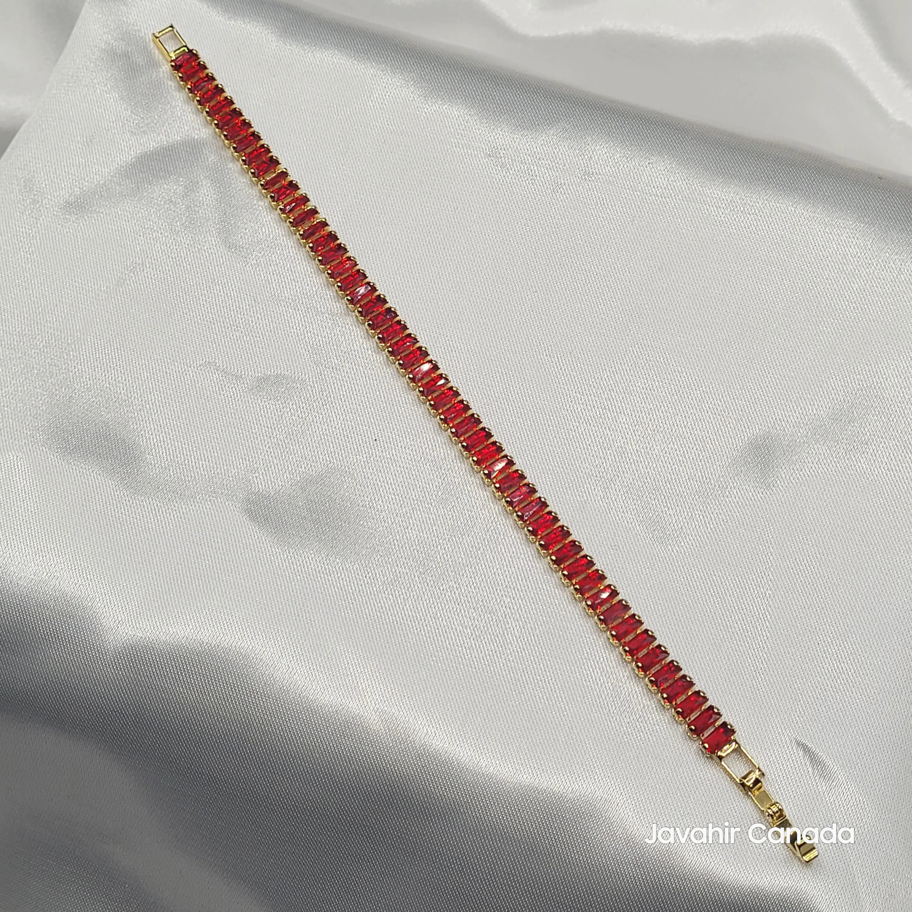 JV4004 red baguette stone bracelet with gold finish on satin
