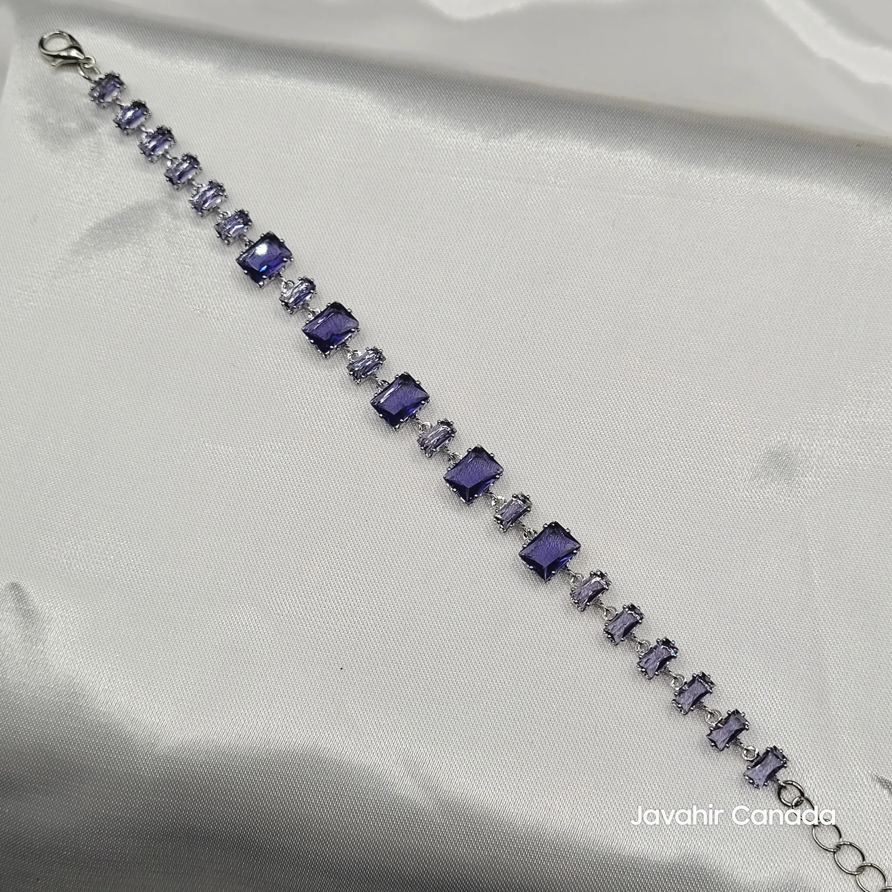 JV4007 bracelet with deep purple emerald-cut stones in a silver-tone setting