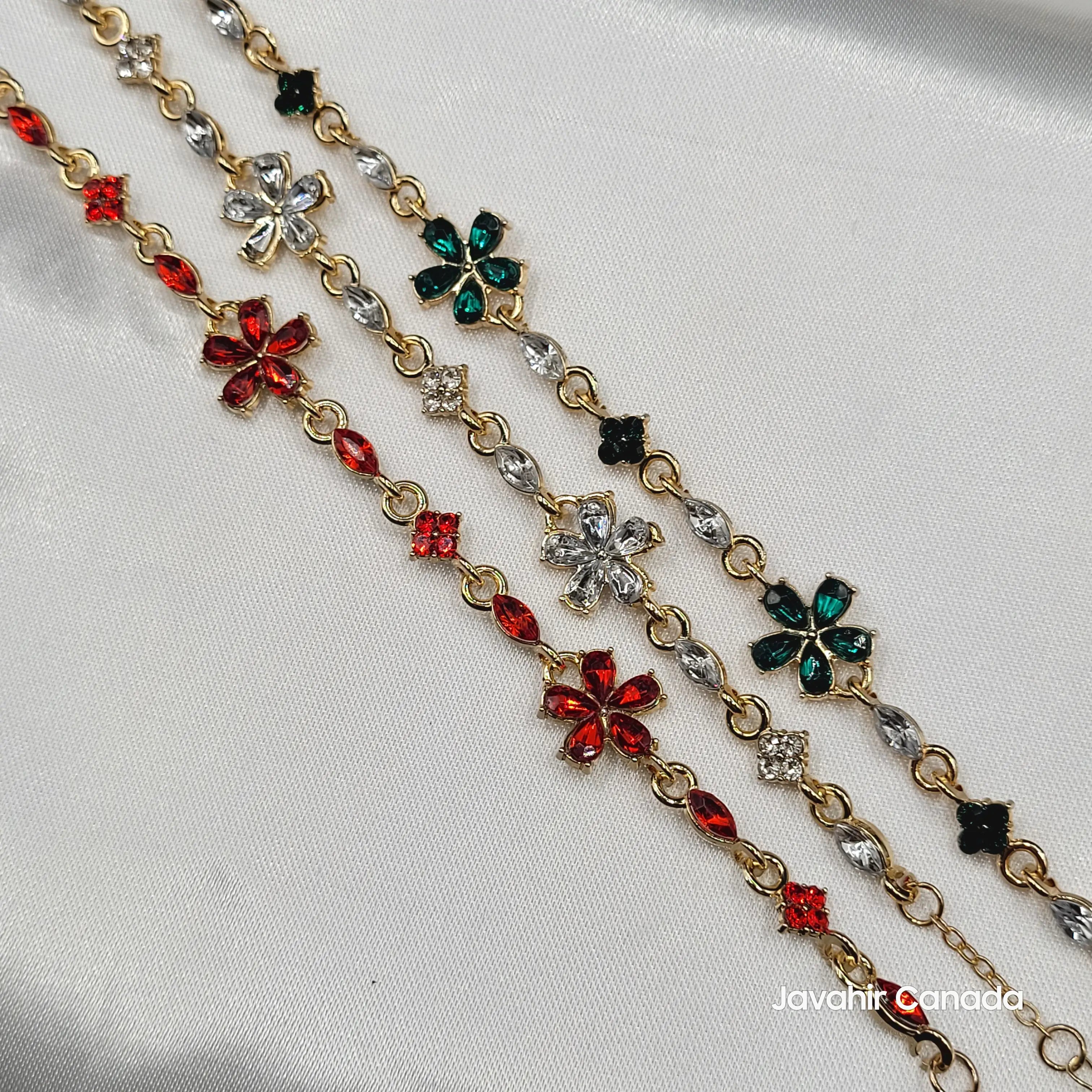 JV4012 gold-tone floral link bracelets with red, green, and clear CZ stones