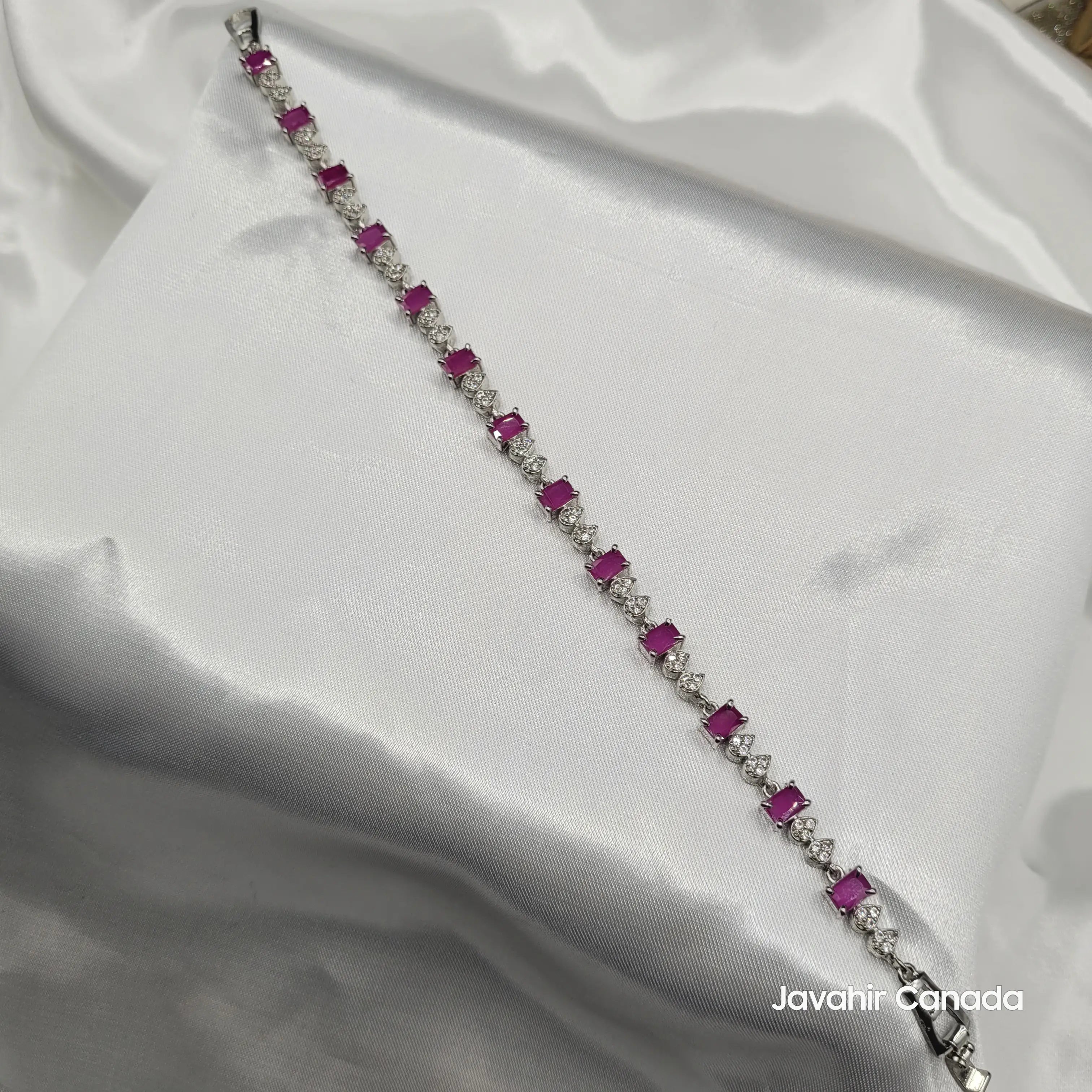 JV4016 silver bracelet with ruby pink princess cut CZ stones and teardrop American diamonds