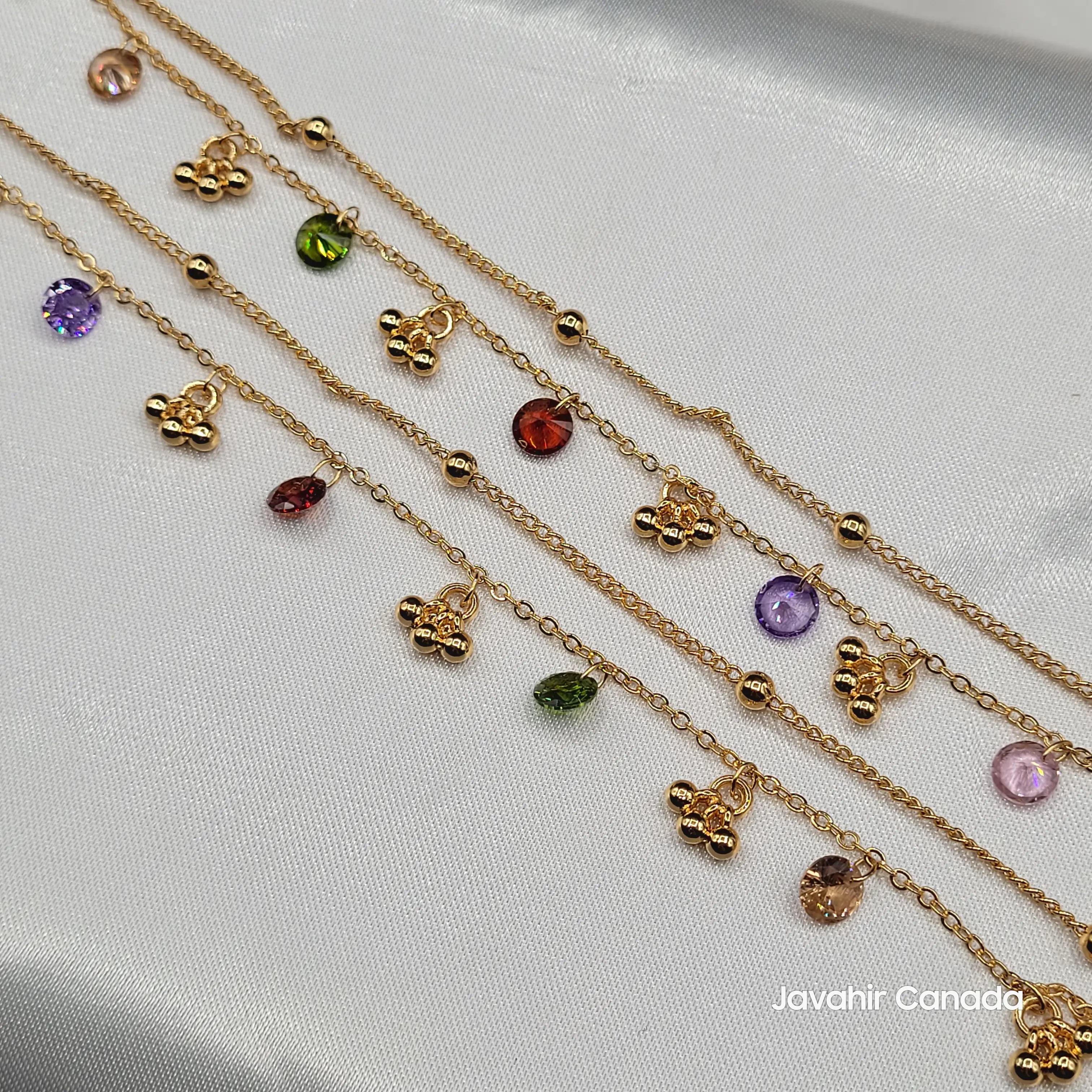 JV5006 gold plated anklet pair with multicolor stones and gold cluster charms