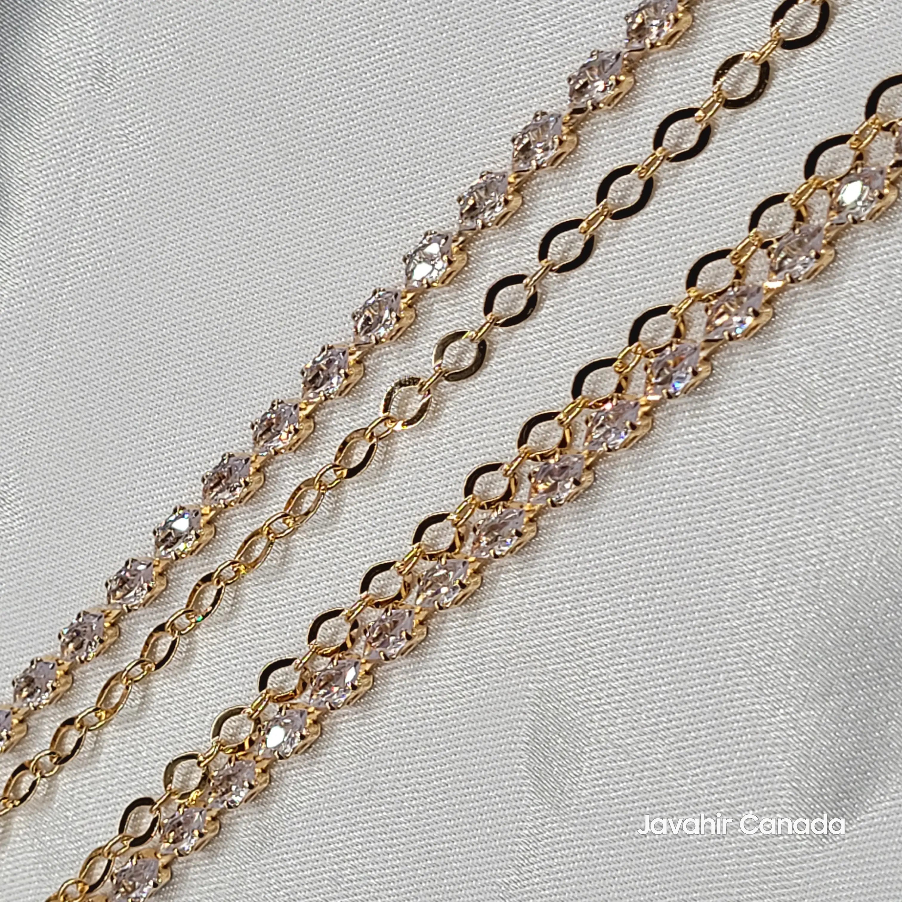 Close-up of JV5009 anklets showing sparkling round crystals and gold chain design