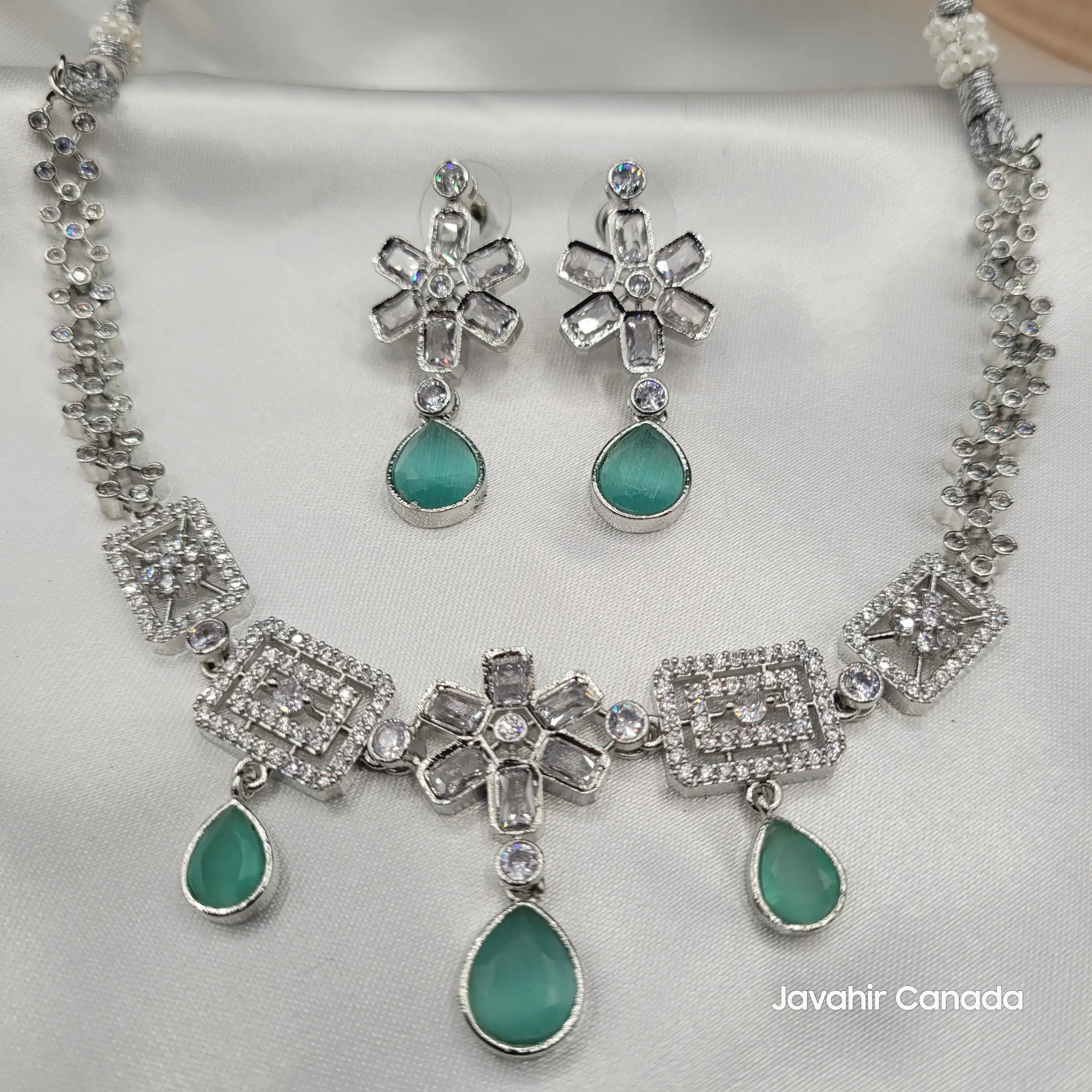 Mint green JV14 necklace and earrings set with Cubic Zirconia framing