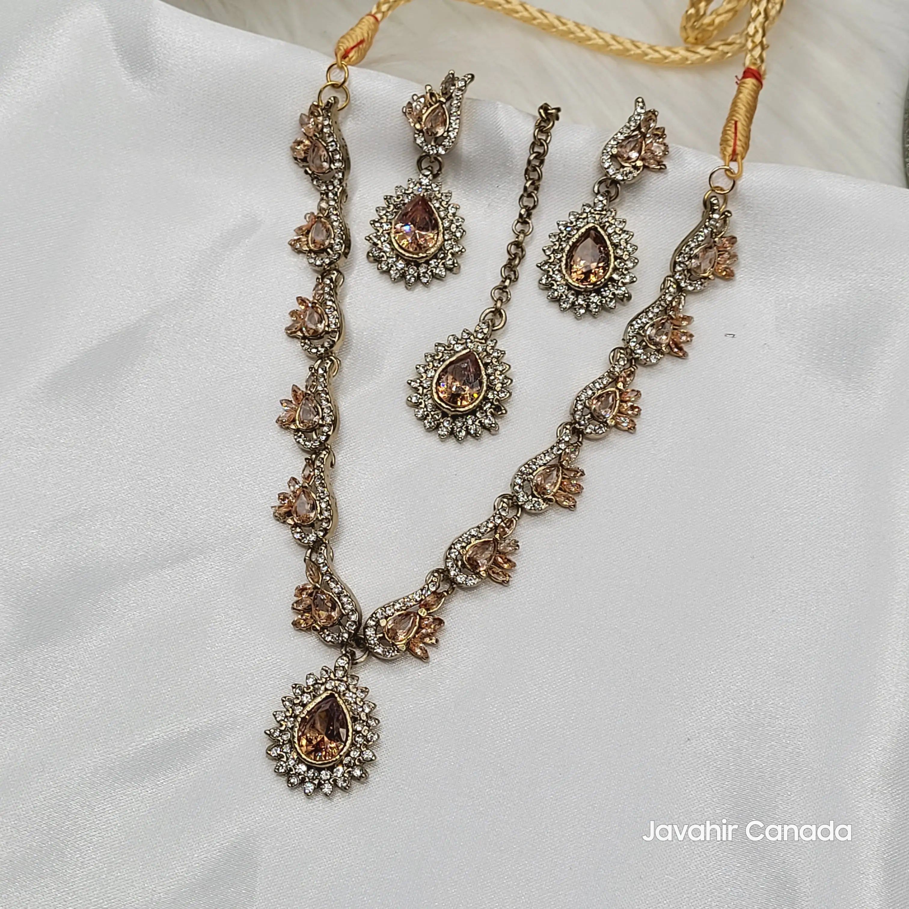 JV142 champagne toned necklace set with soft golden teardrops and CZ petals