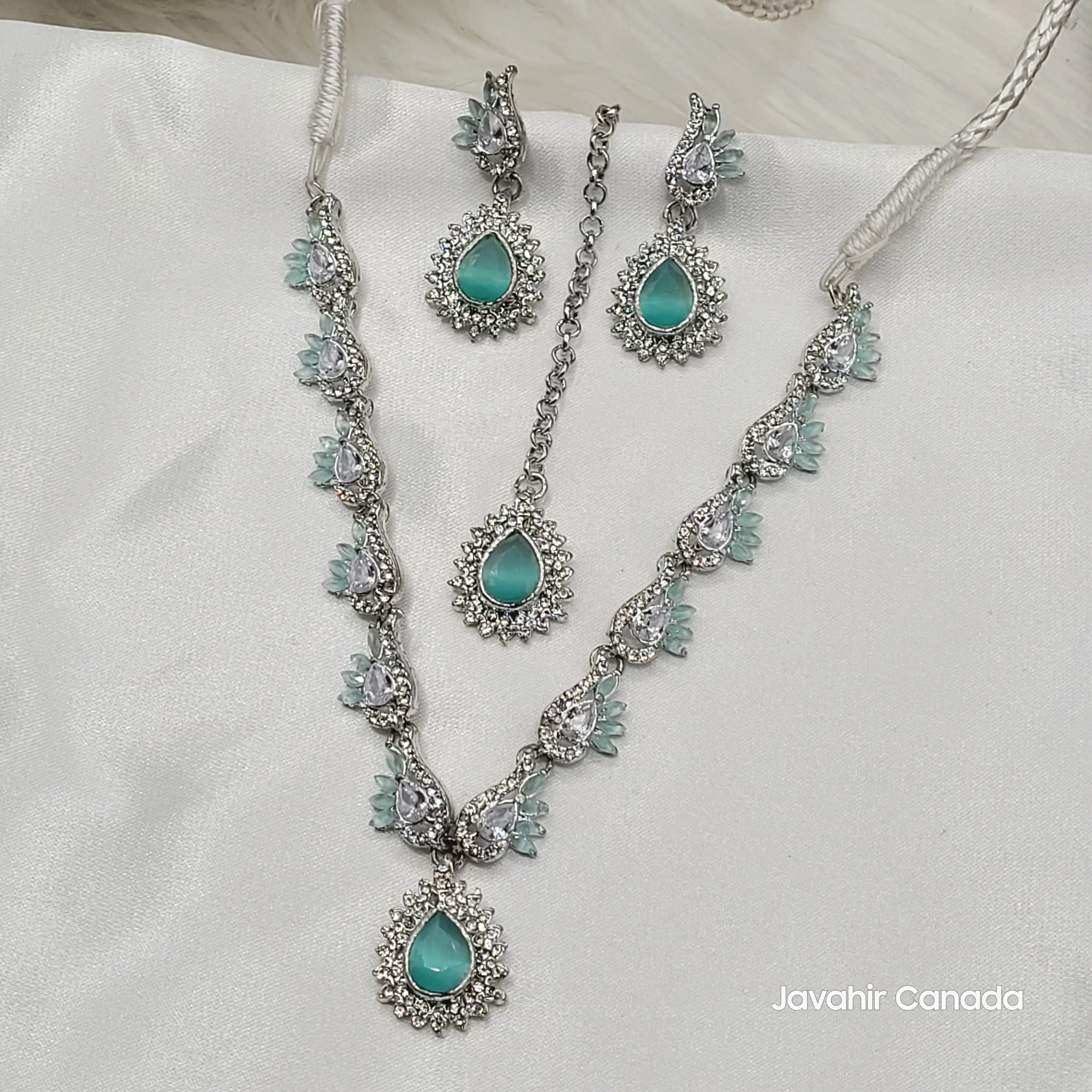 JV142 mint green necklace set with soft green center stones and floral CZ frame