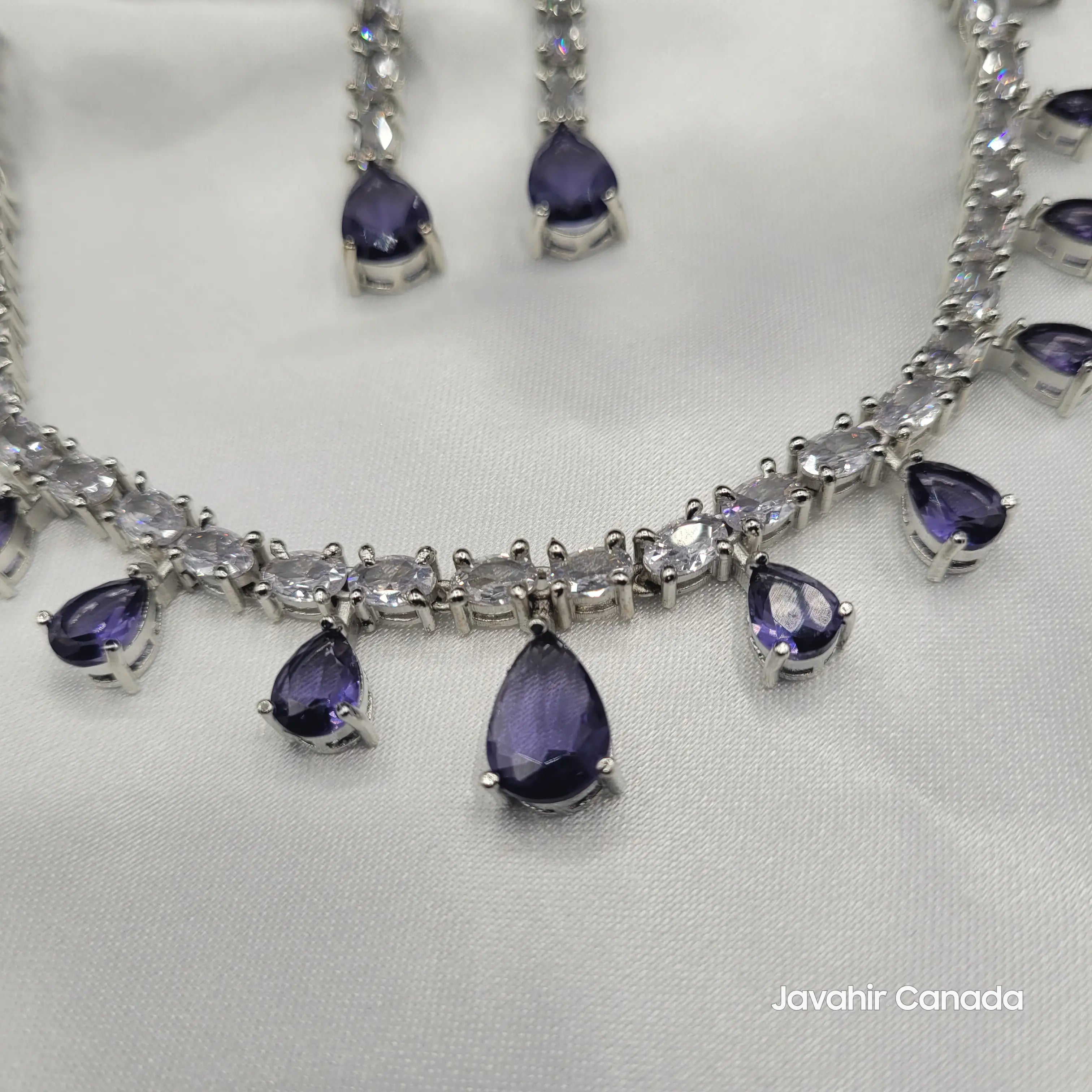 Detail view of JV145 lavender necklace showing drop-shaped amethyst CZ stones.
