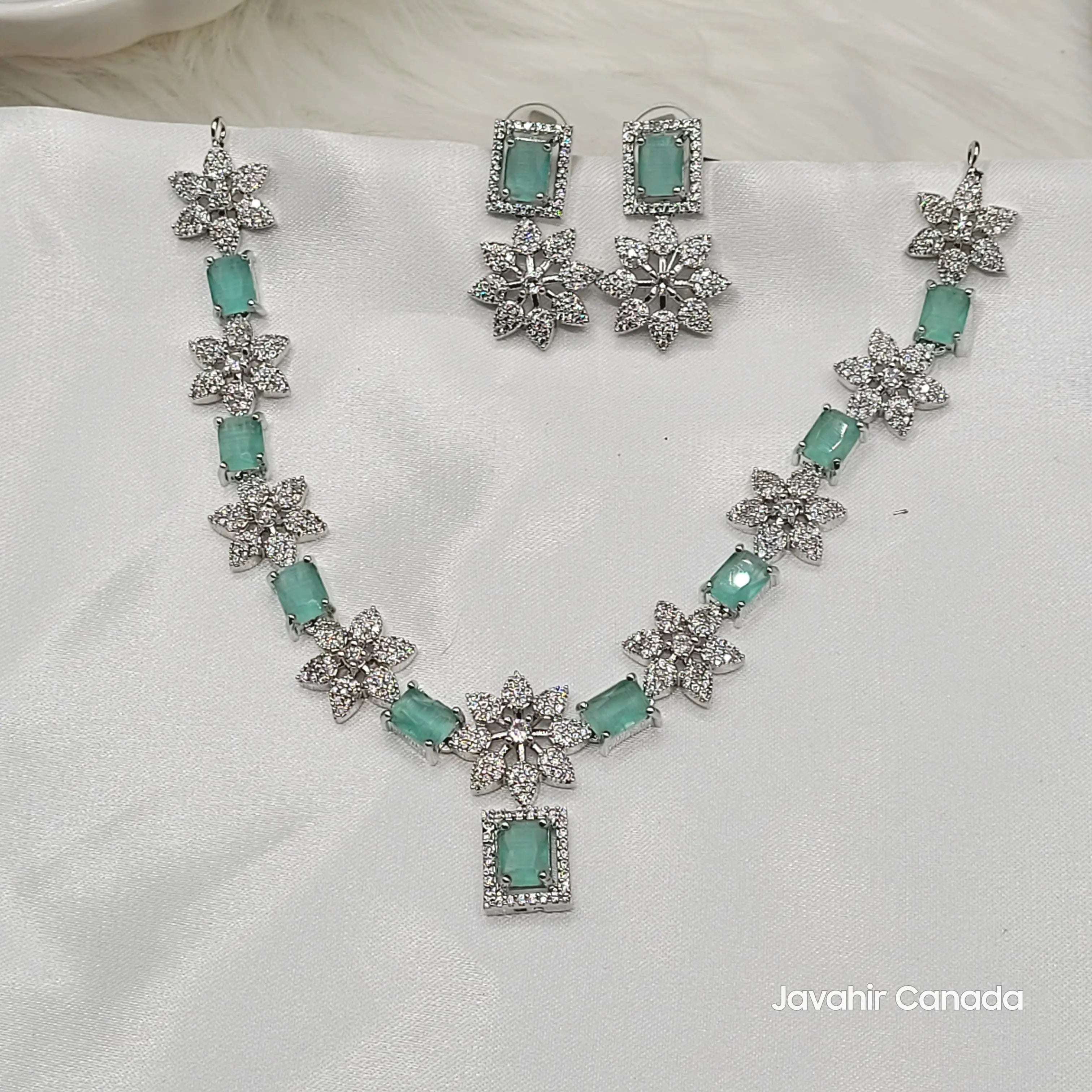 JV146 full set in mint green and clear CZ – includes necklace and earrings.