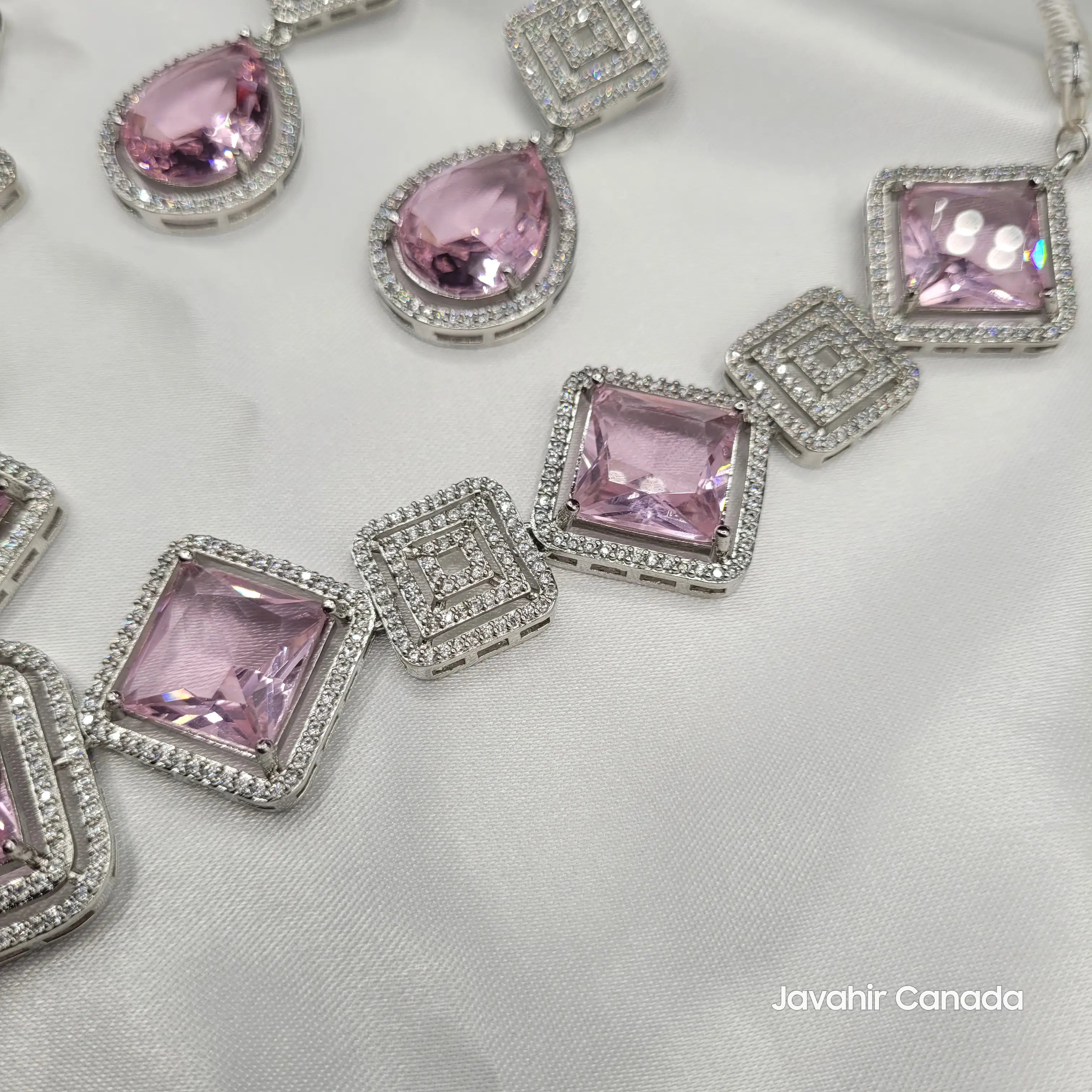 Side view of JV149 rose pink square-cut necklace layout showing fine zircon work.
