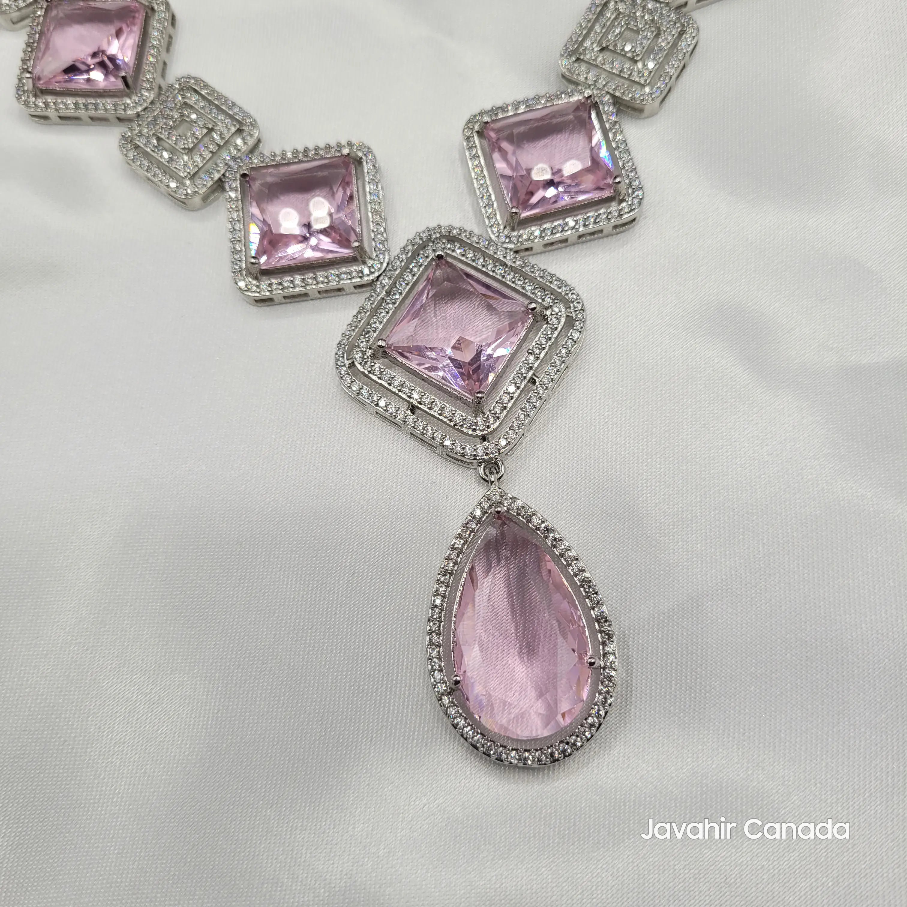 Pendant close-up of JV149 rose pink necklace featuring large teardrop gemstone.