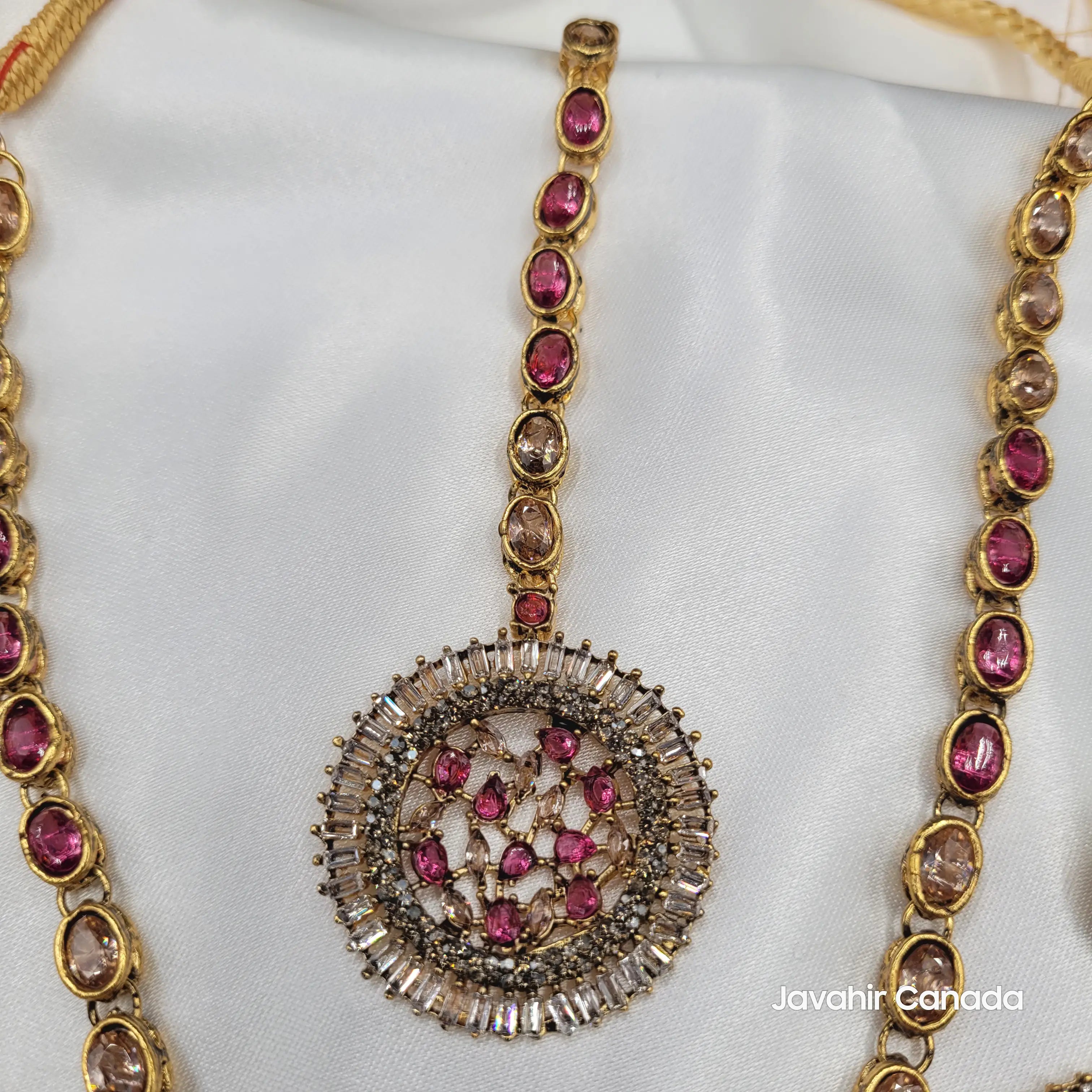 Detailed shot of teeka from JV16 pink variant with American diamond and pink accents