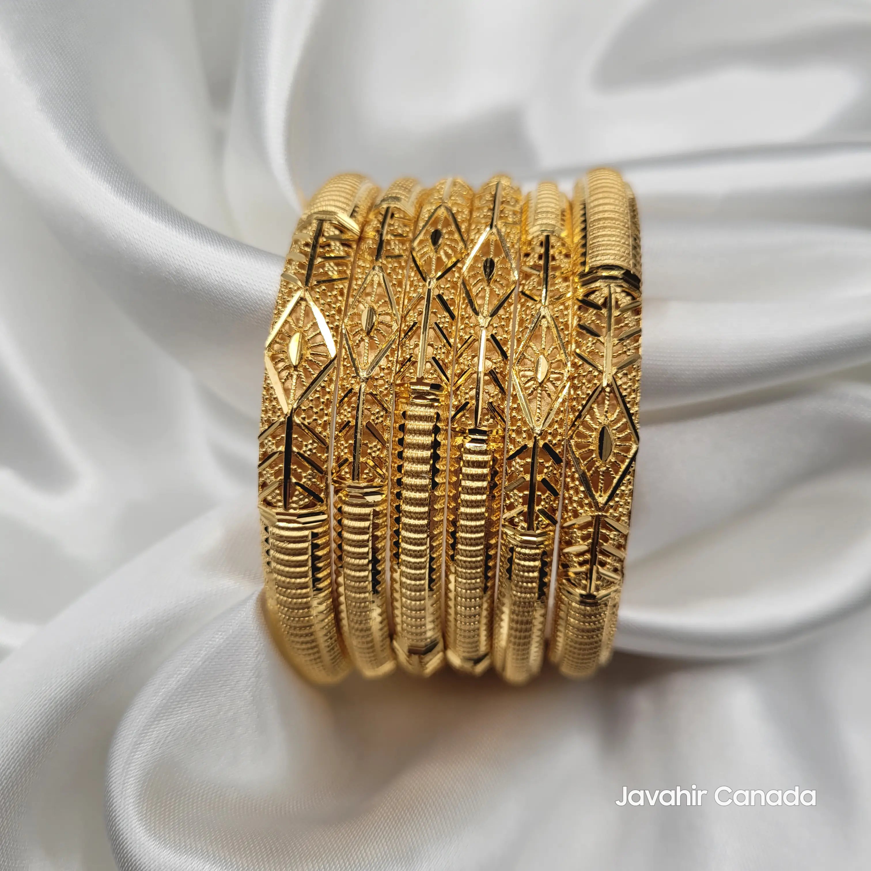 Front view of JV3036 Pakistani gold plated bangles with diamond motifs